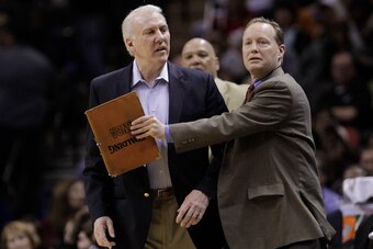Atlanta Hawks head coach Mike Budenholzer (right) came up through the San Antonio Spurs system.
