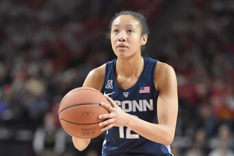 COLLEGE PARK, MD - DECEMBER 29:  Saniya Chong #12 of the Connecticut Huskies takes a foul shot during a women's college basketball game against the Maryland Terrapins at the XFinity Center on December 29, 2016 in College Park, Maryland.  The Huskies won 8