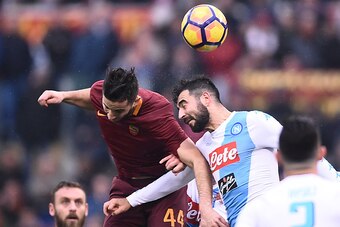 Roma's defender from Greece Kostas Manolas (L) fights for the ball with Napoli's defender from Spain Raul Albiol during the Italian Serie A football match AS Roma vs Napoli on March 4, 2017 at the Olympic Stadium in Rome.  / AFP PHOTO / FILIPPO MONTEFORTE