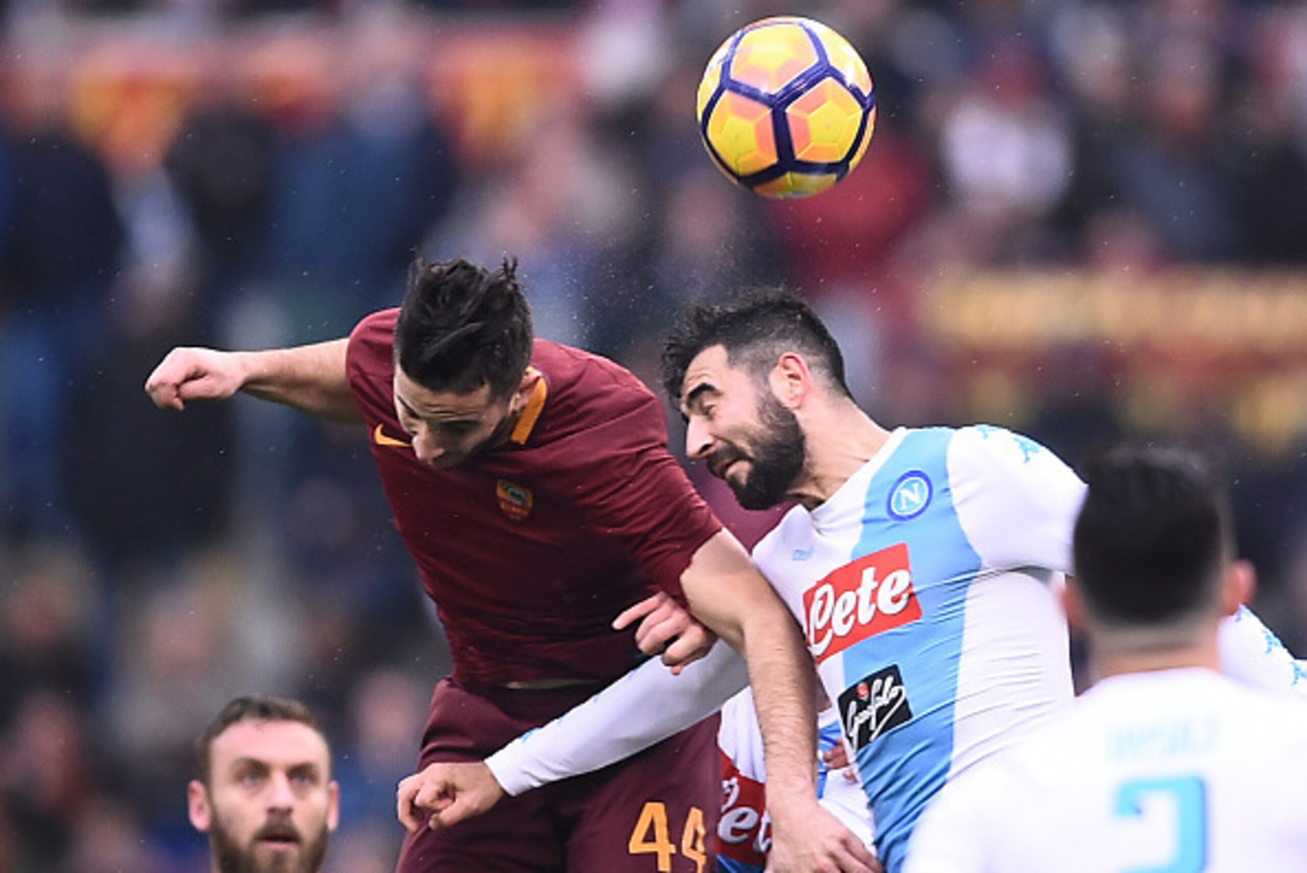 Roma's defender from Greece Kostas Manolas (L) fights for the ball with Napoli's defender from Spain Raul Albiol during the Italian Serie A football match AS Roma vs Napoli on March 4, 2017 at the Olympic Stadium in Rome.  / AFP PHOTO / FILIPPO MONTEFORTE