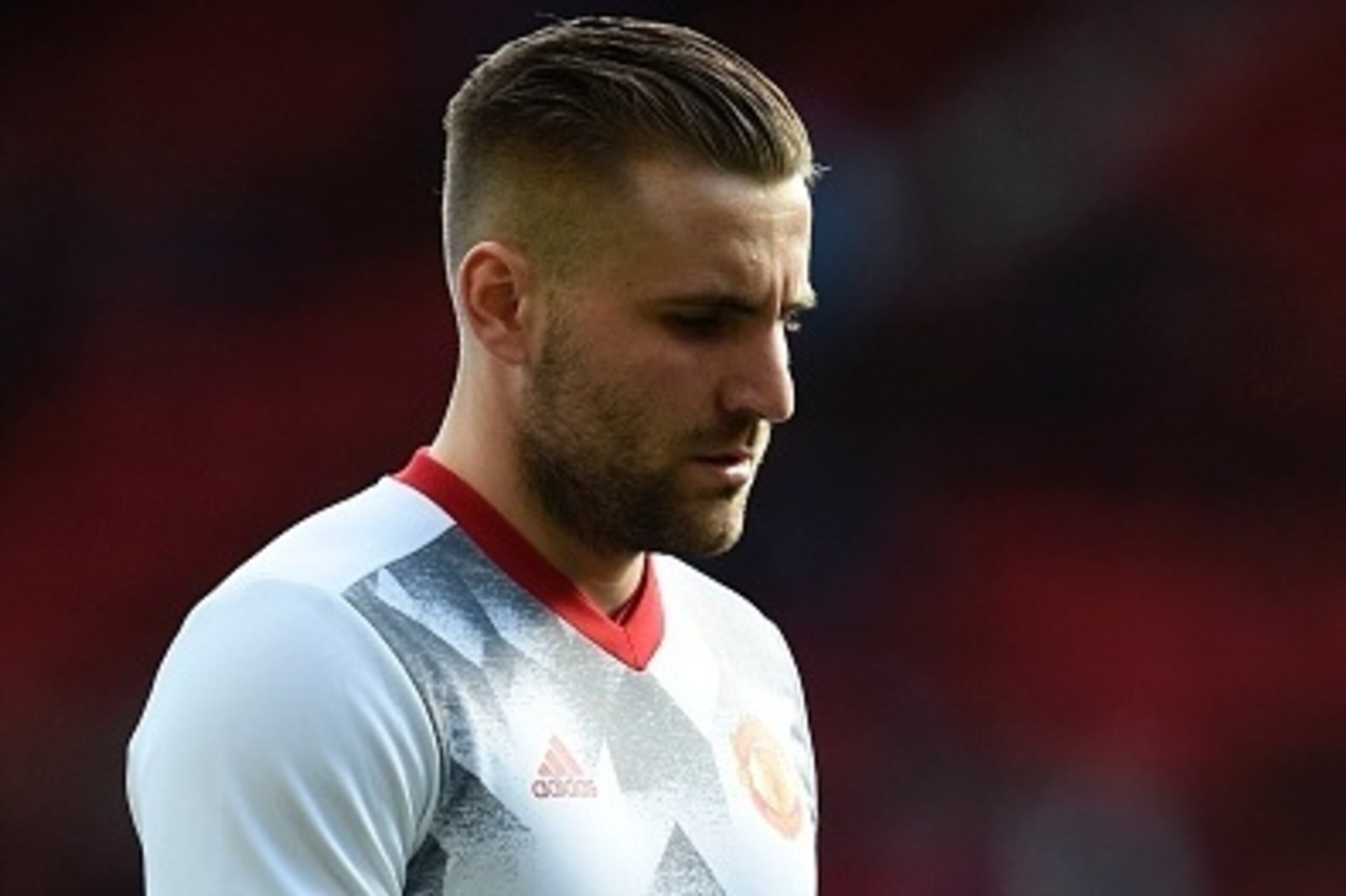Manchester United's English defender Luke Shaw is pictured during warm up ahead of the English Premier League football match between Manchester United and Bournemouth at Old Trafford in Manchester, north west England, on March 4, 2017. / AFP PHOTO / Oli S