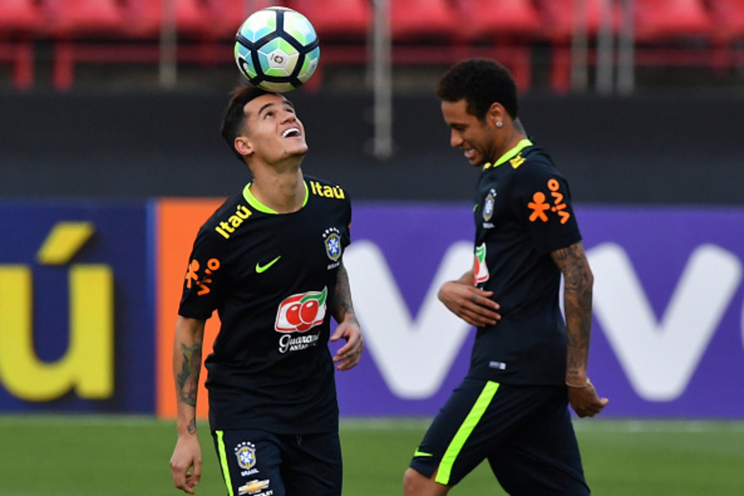Brazil's team players Philippe Coutinho (L) and Neymar (R) take part in a training session at the Morumbi stadium in Sao Paulo, Brazil on March 25, 2017 ahead of a 2018 FIFA World Cup qualifier match against Paraguay on March 28 in Sao Paulo, Brazil. / AF