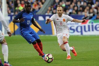 PARIS, FRANCE - MARCH 28: N'Golo Kante of France in action with Andres Iniesta of Spain during the Friendly game between France and Spain at Stade de France on march 28, 2017 in Paris, France. (Photo by Xavier Laine/Getty Images) PARIS, FRANCE - MARCH 28: N'Golo Kante of France in action with Andres Iniesta of Spain during the Friendly game between France and Spain at Stade de France on march 28, 2017 in Paris, France. (Photo by Xavier Laine/Getty Images)