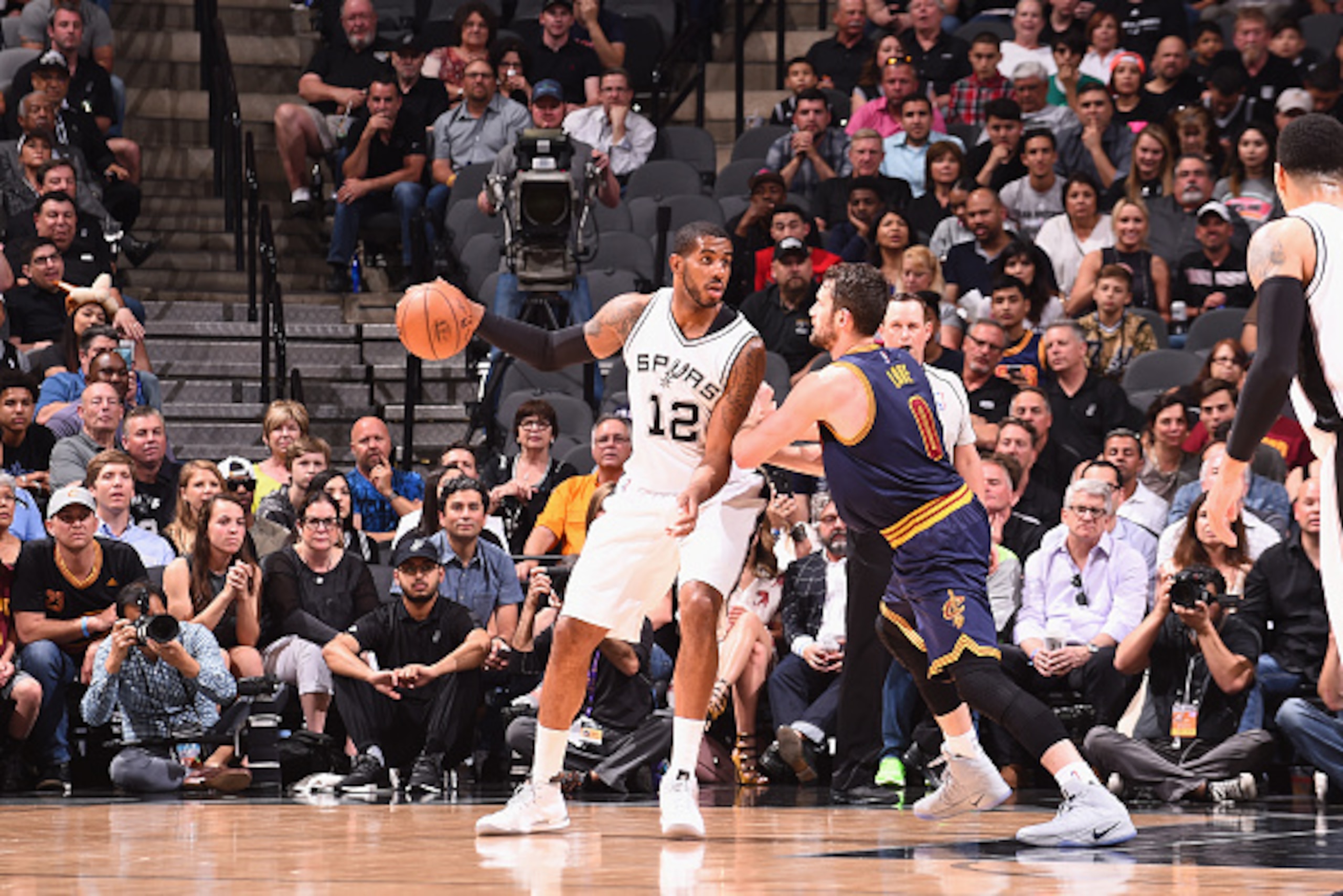 SAN ANTONIO, TX - MARCH 27:  LaMarcus Aldridge #12 of the San Antonio Spurs handles the ball against the Cleveland Cavaliers on March 27, 2017 at the AT&T Center in San Antonio, Texas. NOTE TO USER: User expressly acknowledges and agrees that, by download