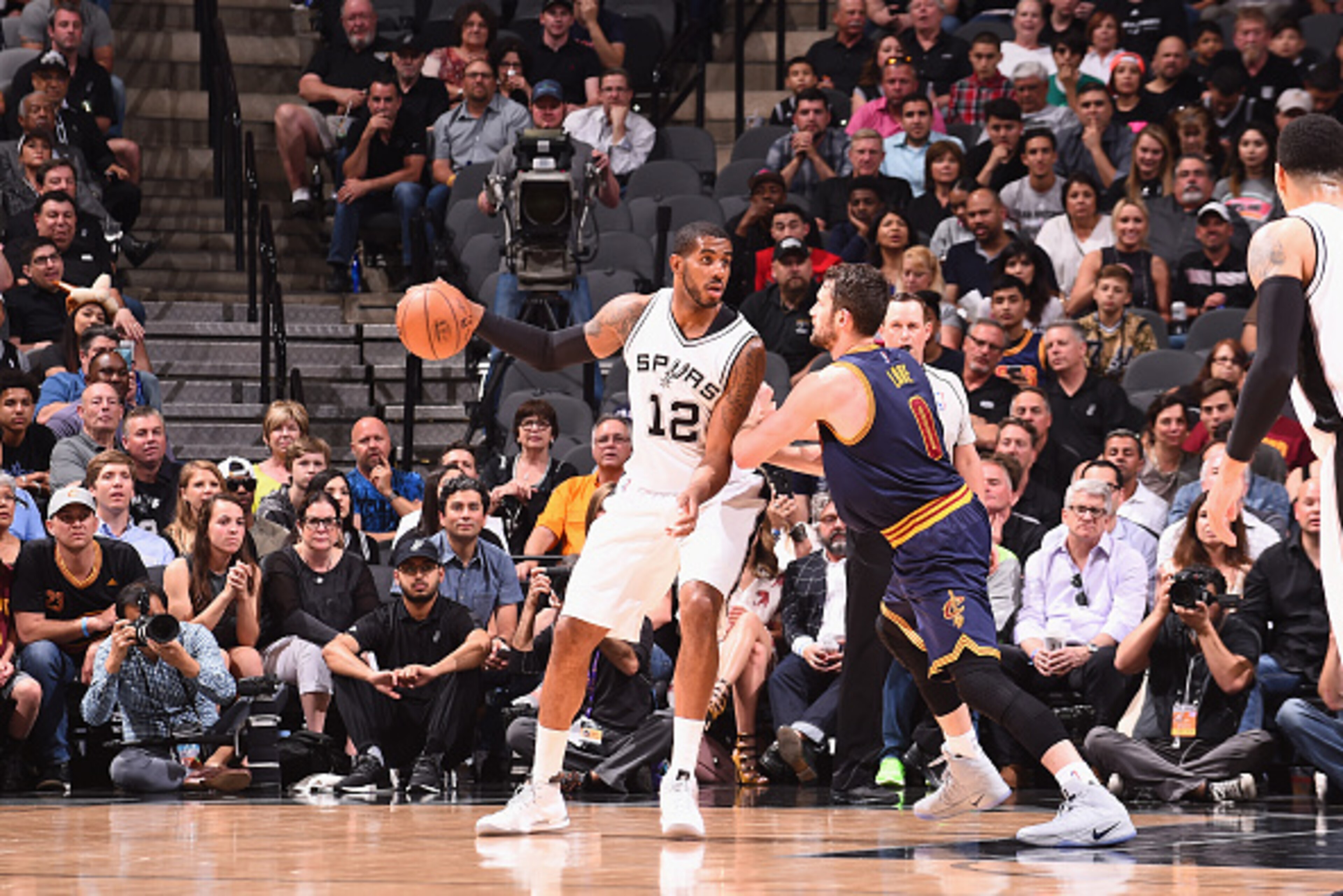 SAN ANTONIO, TX - MARCH 27:  LaMarcus Aldridge #12 of the San Antonio Spurs handles the ball against the Cleveland Cavaliers on March 27, 2017 at the AT&T Center in San Antonio, Texas. NOTE TO USER: User expressly acknowledges and agrees that, by download