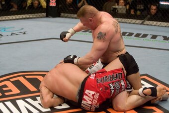 LAS VEGAS - FEBRUARY 2:  Frank Mir (red/black shorts) def. Brock Lesnar (white/black shorts) - Submission (knee bar) - 1:30 round 1 during the UFC 81 at Mandalay Bay on February 2, 2008 in Las Vegas, Nevada. (Photo by: Josh Hedges/Zuffa LLC via Getty Imag