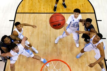 North Carolina and Butler players compete for a rebound during the NCAA tournament South Regional on March 24, 2017.