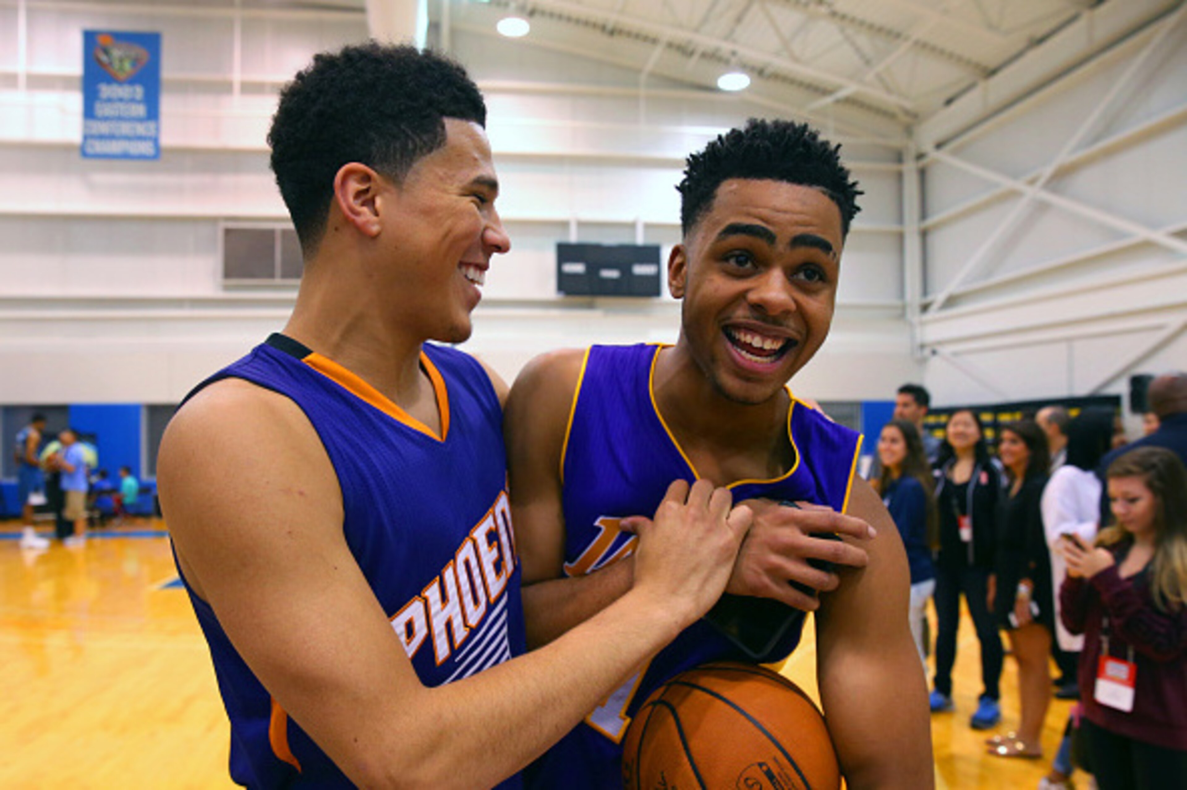 TARRYTOWN, NY - AUGUST 8:  Devin Booker #1 of the Phoenix Suns hangs out with D'Angelo Russell of the Los Angeles Lakers  during the 2015 NBA rookie photo shoot on August 8, 2015 at the Madison Square Garden Training Facility in Tarrytown, New York. NOTE 