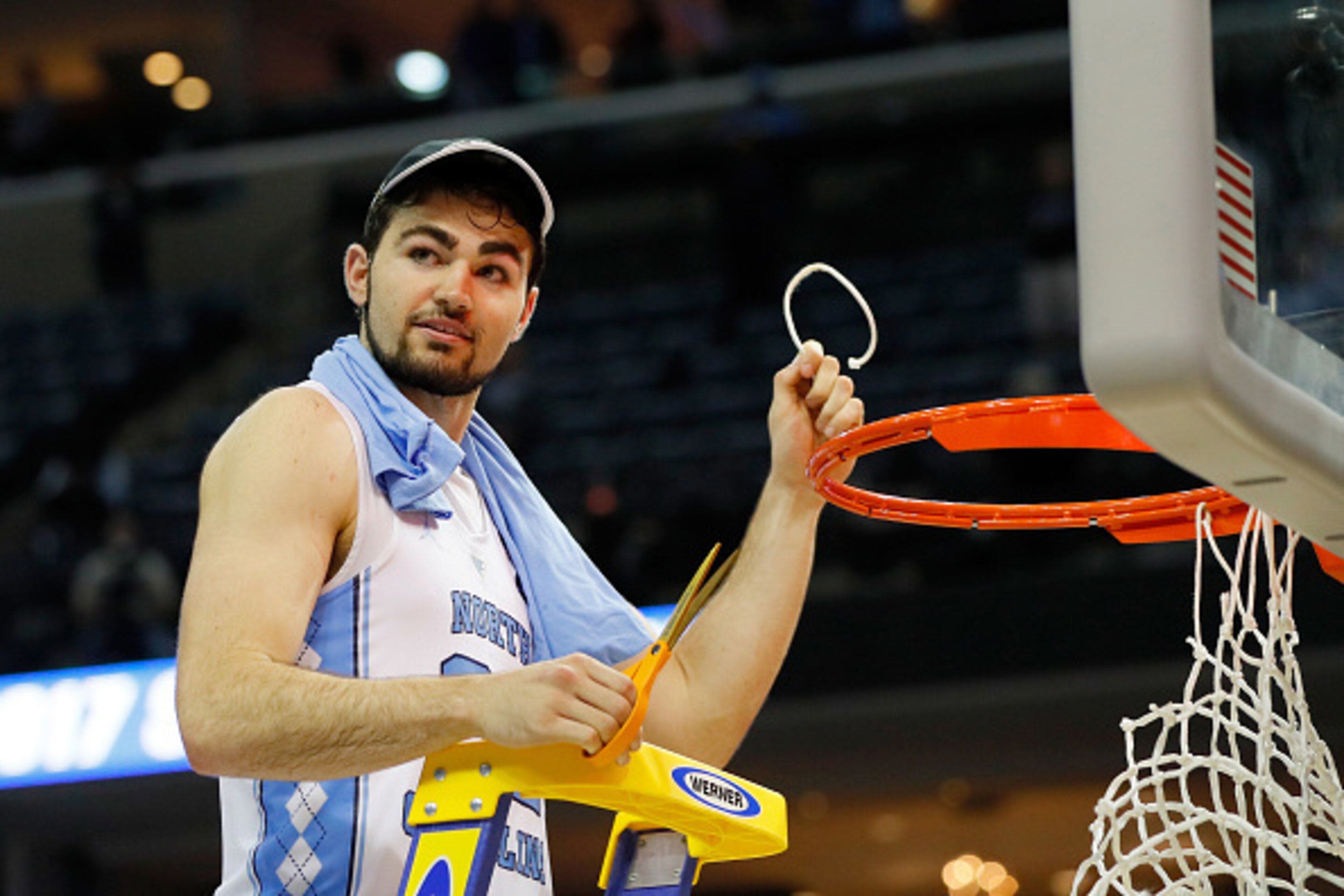 MEMPHIS, TN - MARCH 26:  Luke Maye #32 of the North Carolina Tar Heels cuts down the net after making the game winning shot and defeating the Kentucky Wildcats during the 2017 NCAA Men's Basketball Tournament South Regional at FedExForum on March 26, 2017