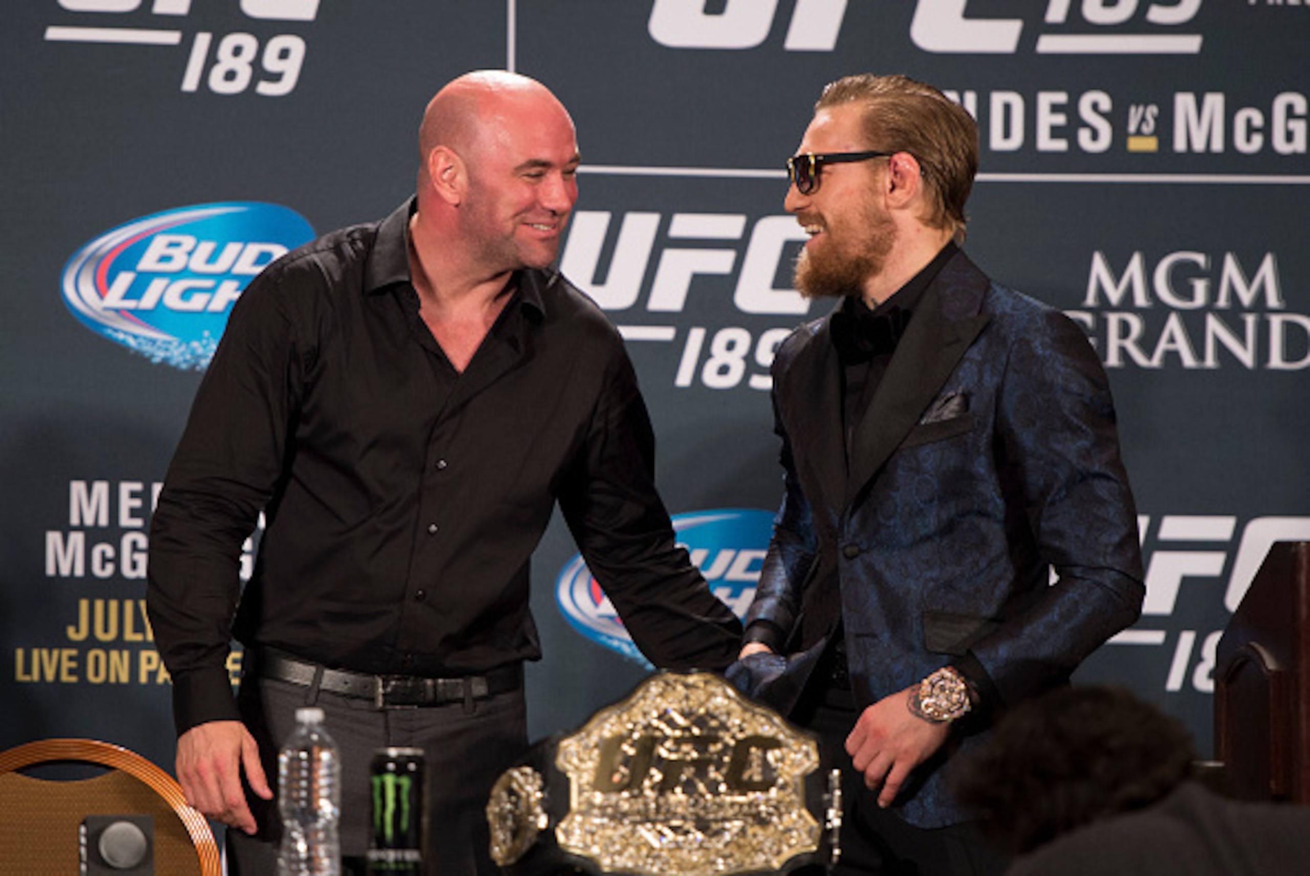 LAS VEGAS, NV - JULY 11: UFC President Dana White (L) and UFC interim featherweight champion Conor McGregor interact during the UFC 189 post fight press conference at the MGM Grand Garden Arena on July 11, 2015 in Las Vegas, Nevada. (Photo by Jeff Bottar LAS VEGAS, NV - JULY 11: UFC President Dana White (L) and UFC interim featherweight champion Conor McGregor interact during the UFC 189 post fight press conference at the MGM Grand Garden Arena on July 11, 2015 in Las Vegas, Nevada. (Photo by Jeff Bottar