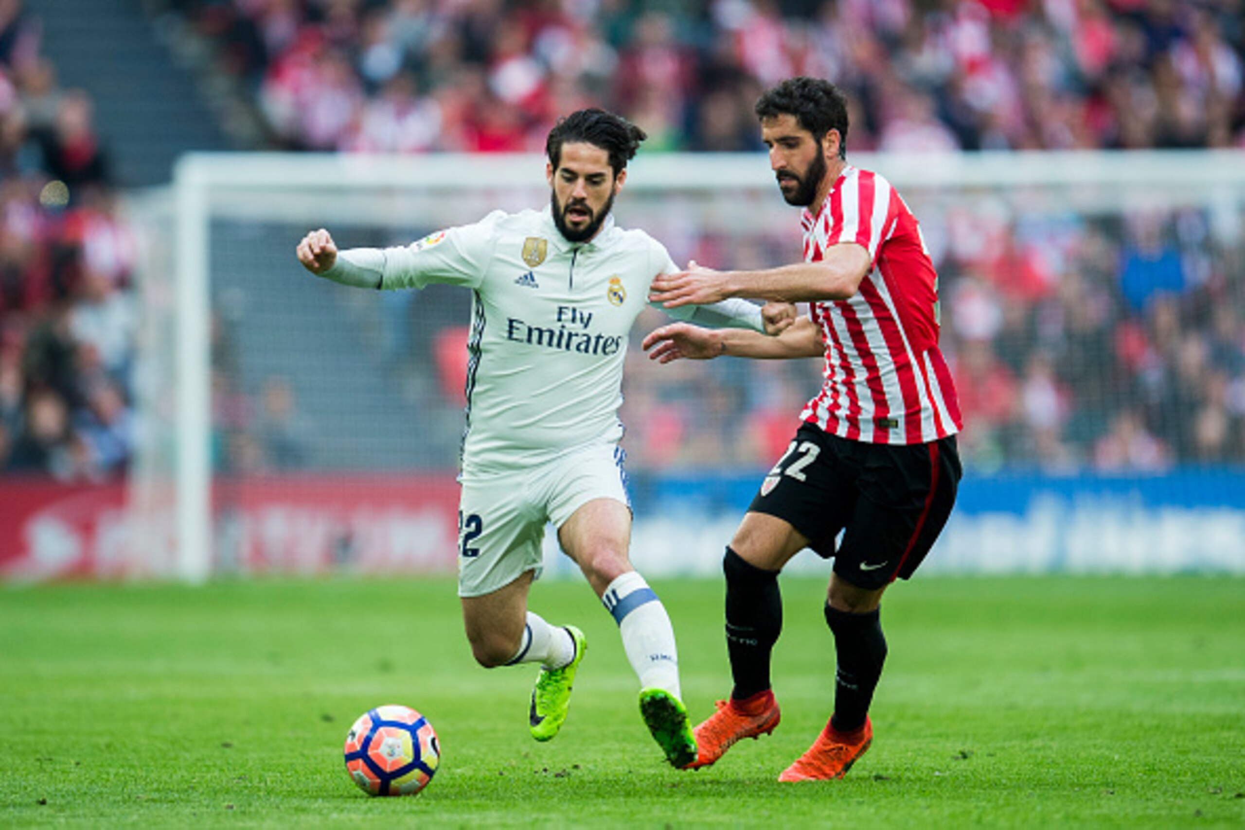 BILBAO, SPAIN - MARCH 18: Isco of Real Madrid competes for the ball with Raul Garcia of Athletic Club during the La Liga match between Athletic Club Bilbao and Real Madrid at San Mames Stadium on on March 18, 2017 in Bilbao, Spain. (Photo by Juan Manuel BILBAO, SPAIN - MARCH 18: Isco of Real Madrid competes for the ball with Raul Garcia of Athletic Club during the La Liga match between Athletic Club Bilbao and Real Madrid at San Mames Stadium on on March 18, 2017 in Bilbao, Spain. (Photo by Juan Manuel