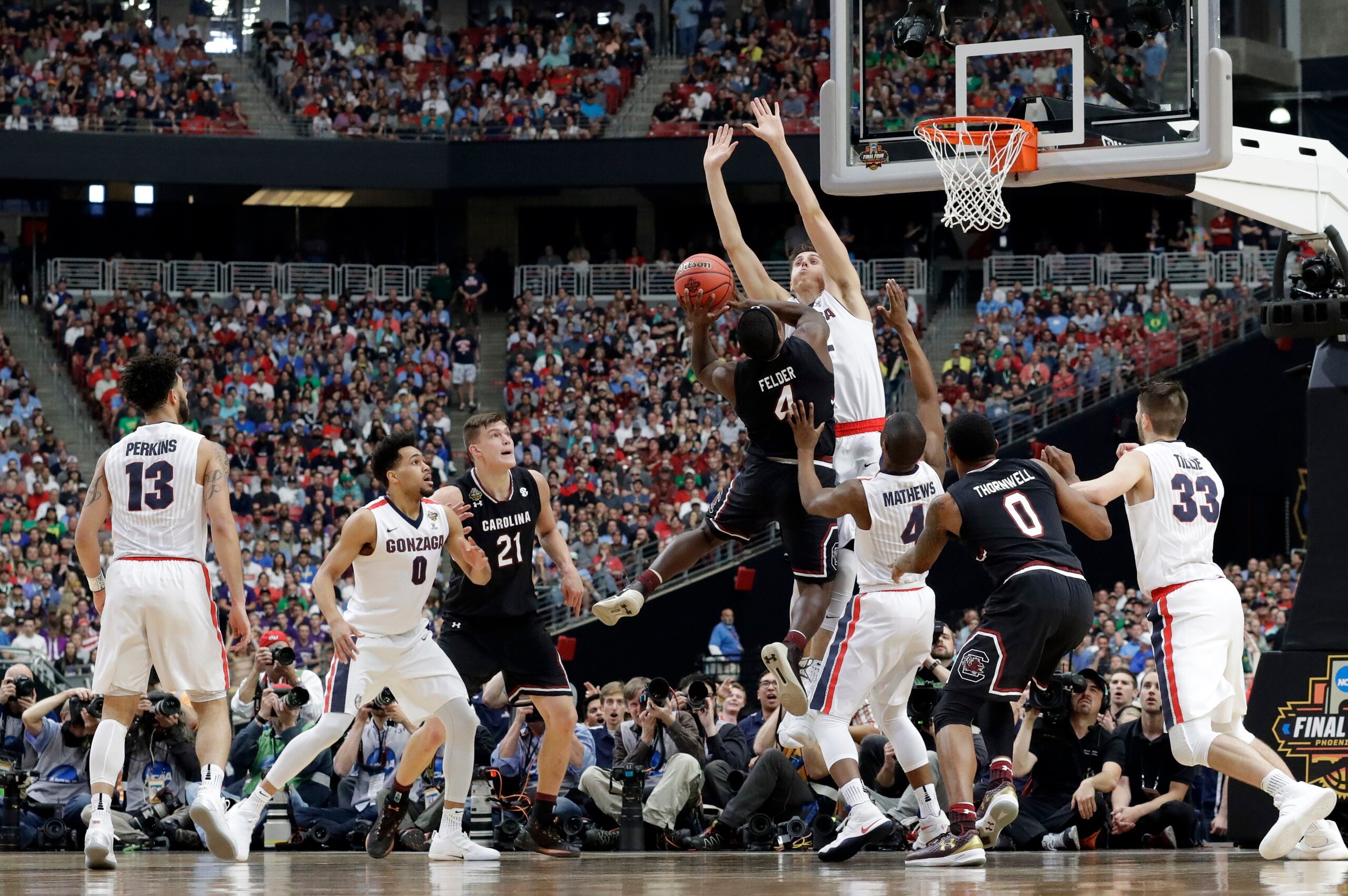 SCAR's Rakym Felder challenges Gonzaga's Zach Collins at the rim. SCAR's Rakym Felder challenges Gonzaga's Zach Collins at the rim.
