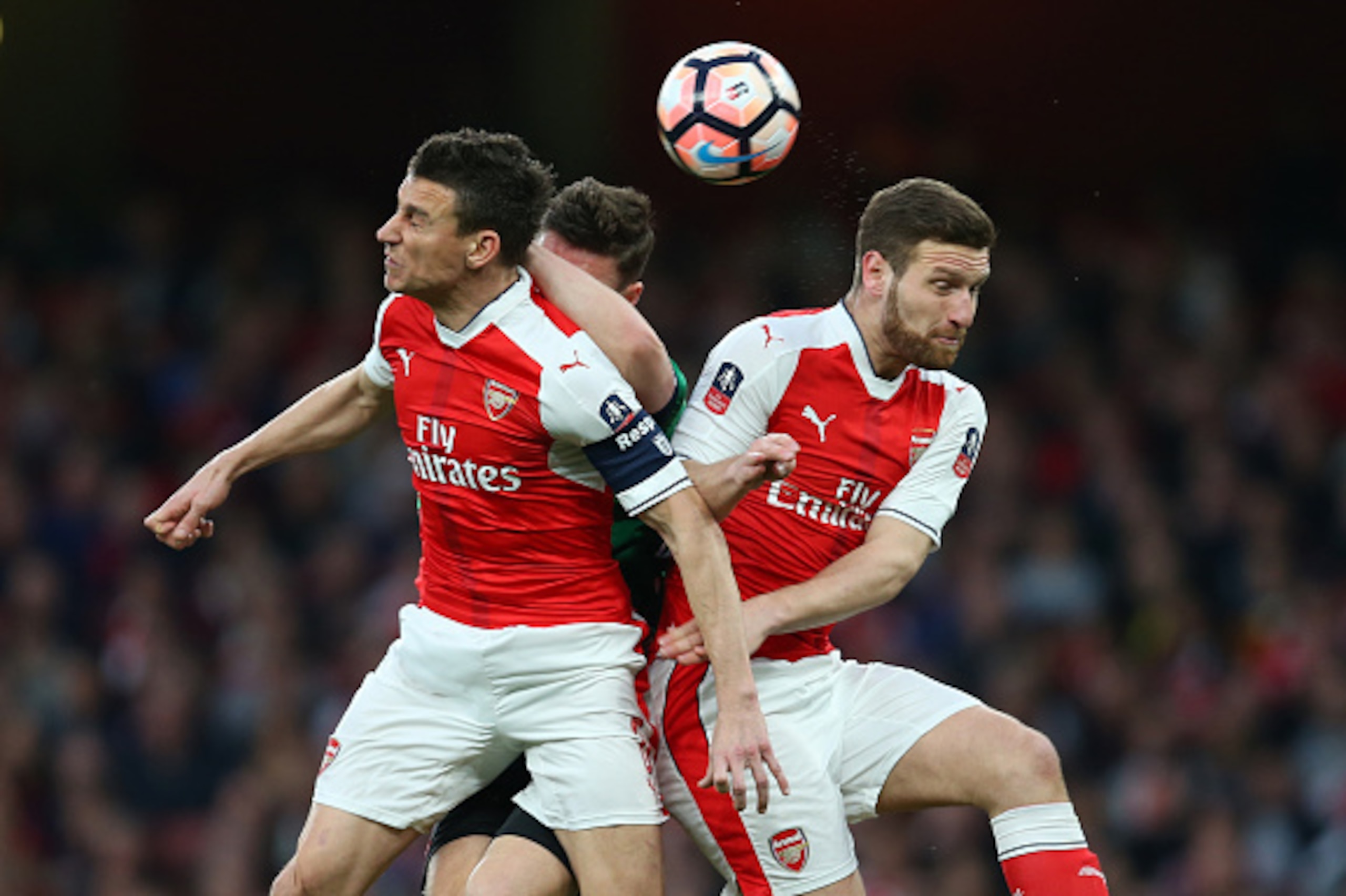 LONDON, ENGLAND - MARCH 11:  Laurent Koscielny of Arsenal and Shkodran Mustafi of Arsenal during The Emirates FA Cup Quarter-Final match between Arsenal and Lincoln City at Emirates Stadium on March 11, 2017 in London, England. (Photo by Catherine Ivill -
