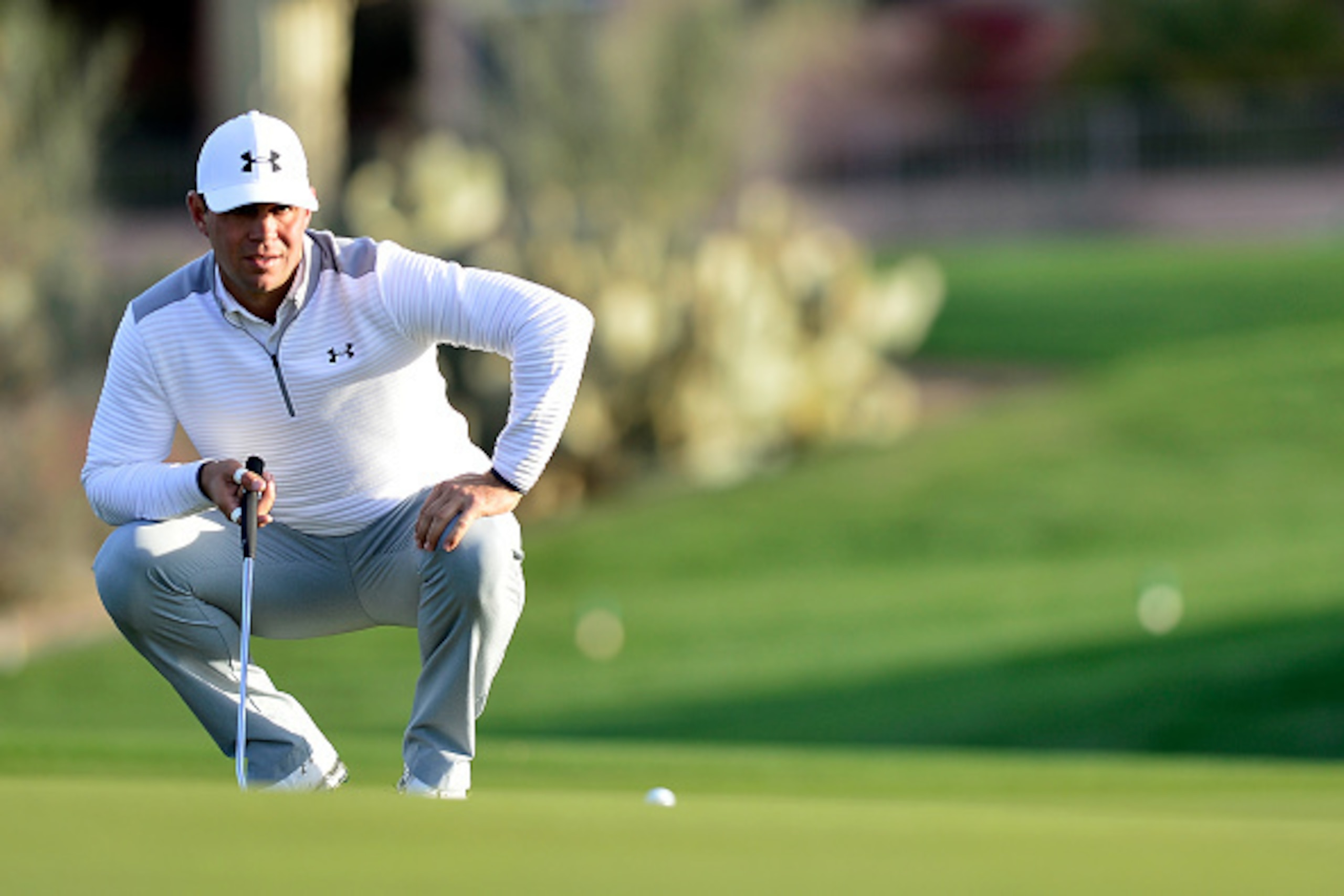 SCOTTSDALE, AZ - FEBRUARY 02:  Gary Woodland lines up his birdie putt on the second green during the first round of the Waste Management Phoenix Open at TPC Scottsdale on February 2, 2017 in Scottsdale, Arizona.  (Photo by Jared C. Tilton/Getty Images)