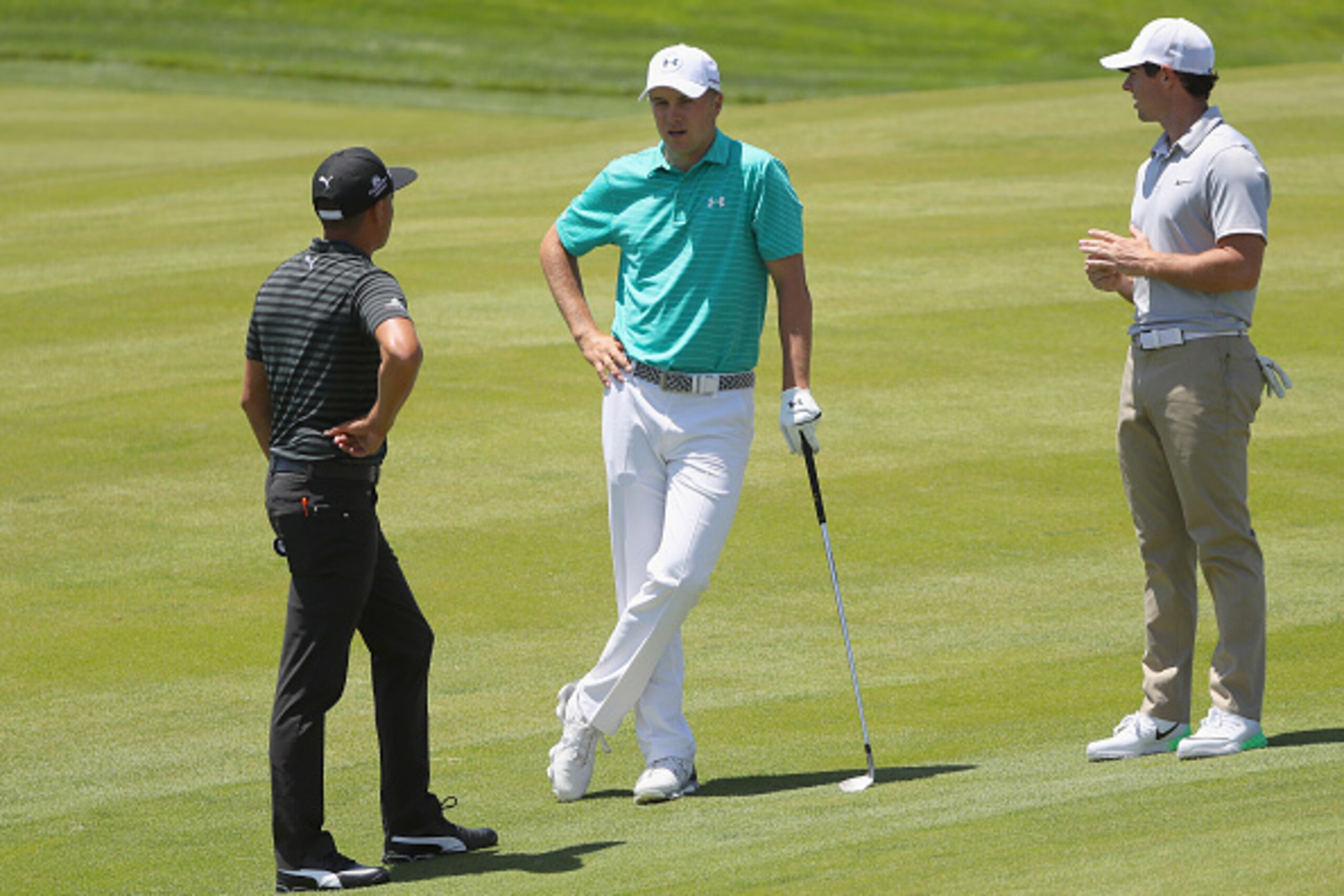OAKMONT, PA - JUNE 13: Rickie Fowler of the United States; Jordan Spieth of the United States and Rory McIlroy of Northern Ireland talk on the fairway during a practice round prior to the U.S. Open at Oakmont Country Club on June 13, 2016 in Oakmont, Penn