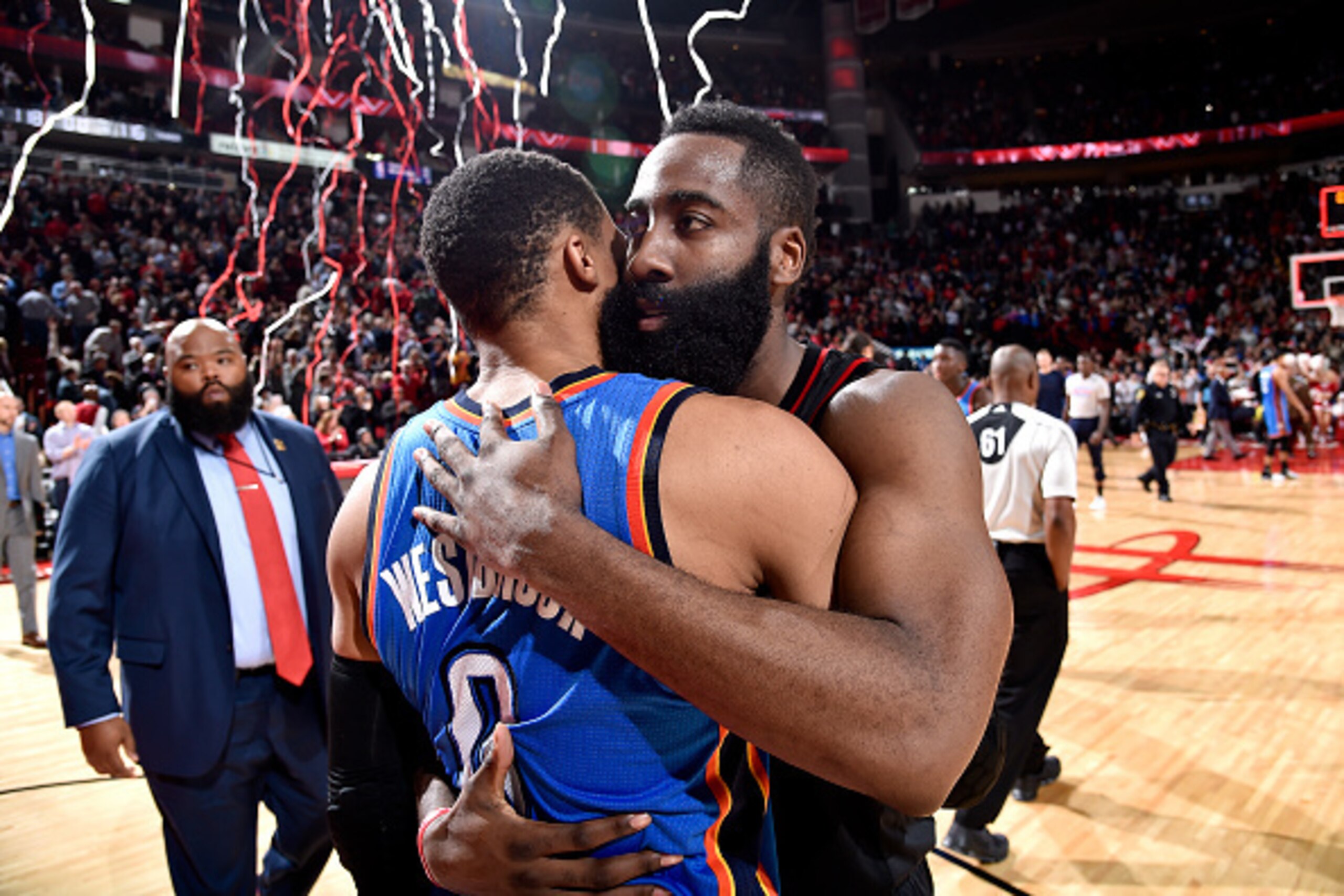 HOUSTON, TX - JANUARY 5: James Harden #13 of the Houston Rockets shares a hug with Russell Westbrook #0 of the Oklahoma City Thunder after the game on January 5, 2017 at the Toyota Center in Houston, Texas. NOTE TO USER: User expressly acknowledges and ag