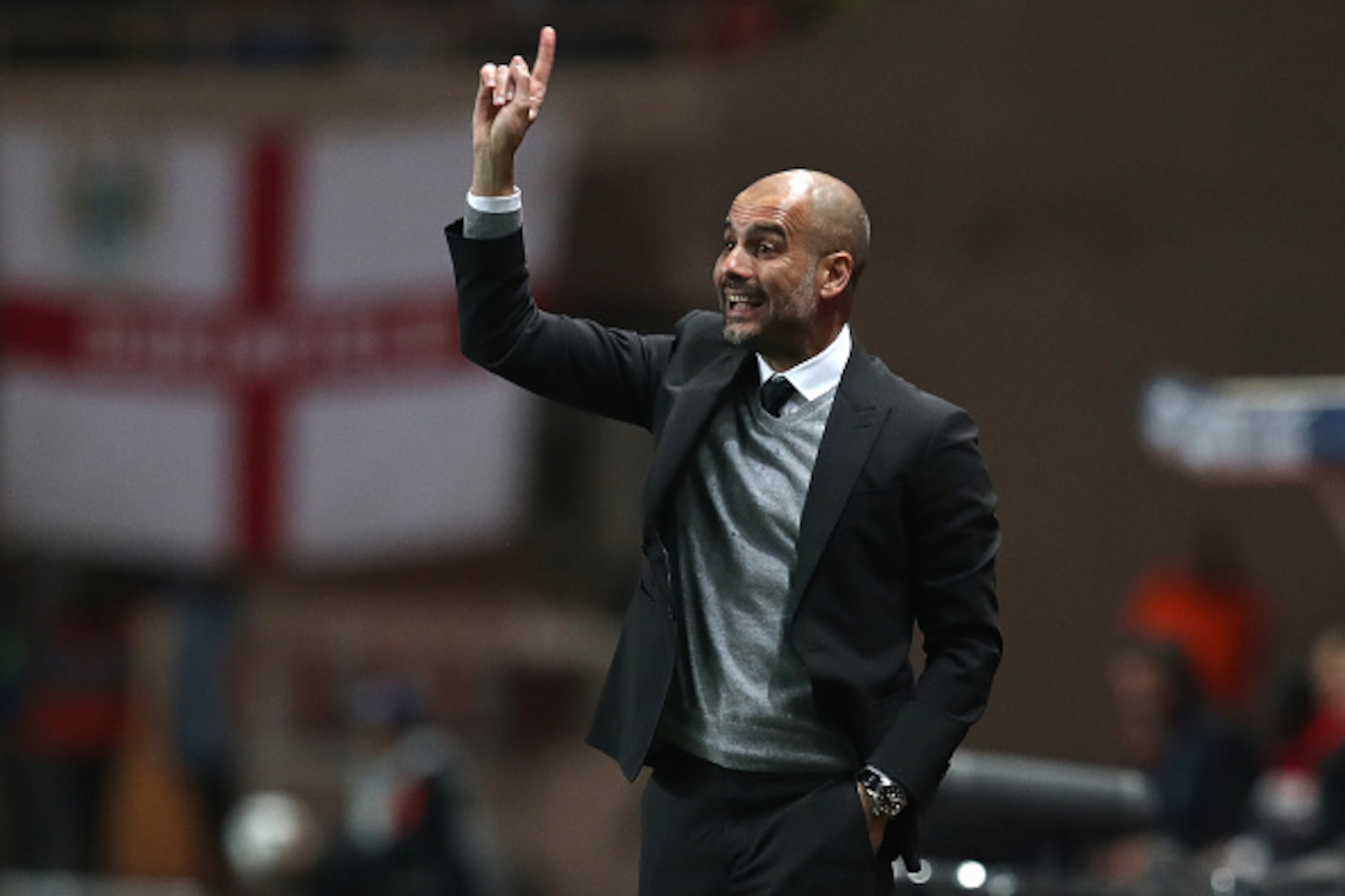 Manchester City's Spanish manager Pep Guardiola reacts during the UEFA Champions League round of 16 football match between Monaco and Manchester City at the Stade Louis II in Monaco on March 15, 2017. / AFP PHOTO / Valery HACHE        (Photo credit should