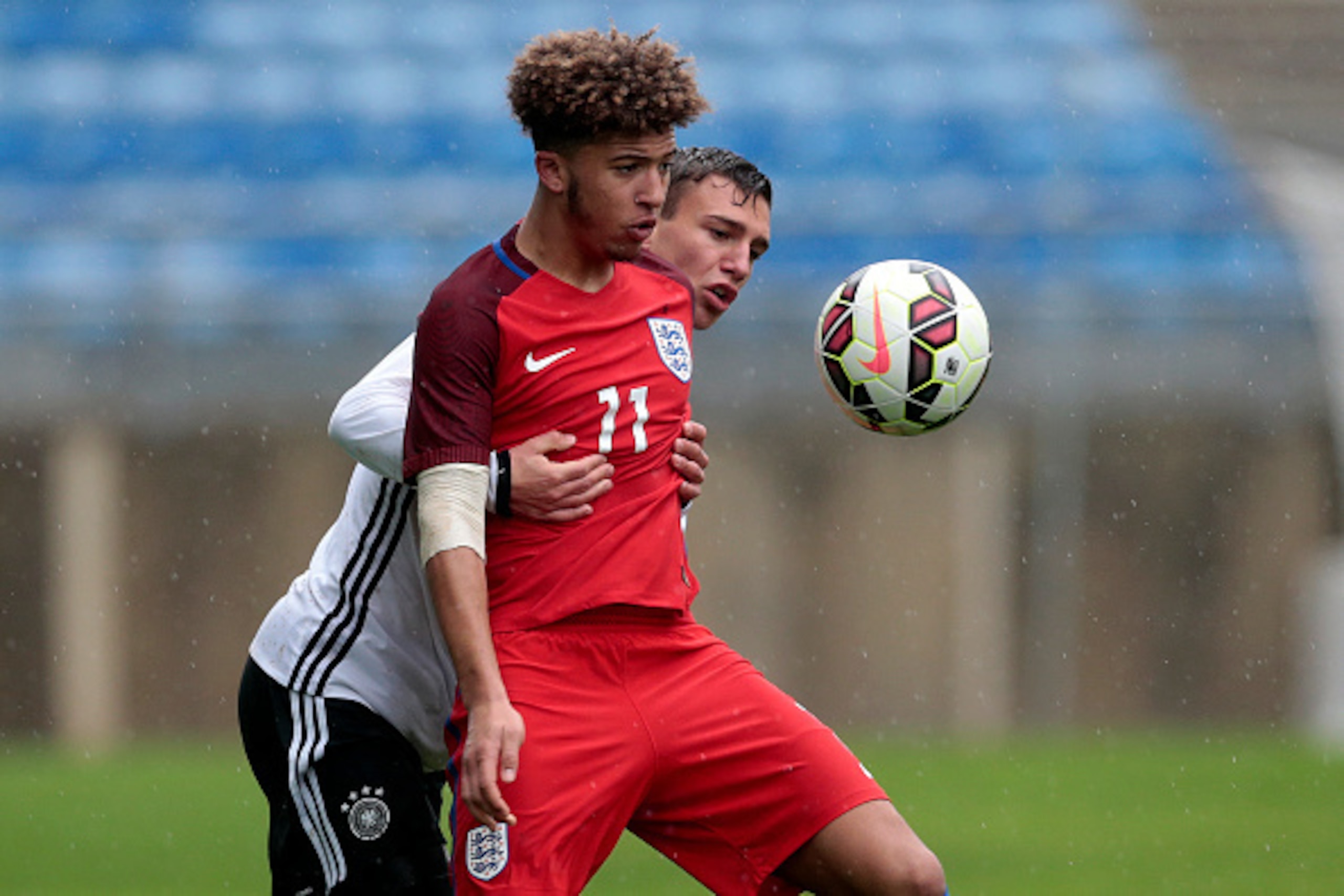 ALBUFEIRA, PORTUGAL - FEBRUARY 12: Jadon Malik Sancho (R) of England U17 challenges Alexander Nitzl (L) of Germany U17 during the U17 Algarve Cup Tournament Match between England U17 and Germany U17 on February 12, 2017 in Albufeira, Portugal. (Photo by F