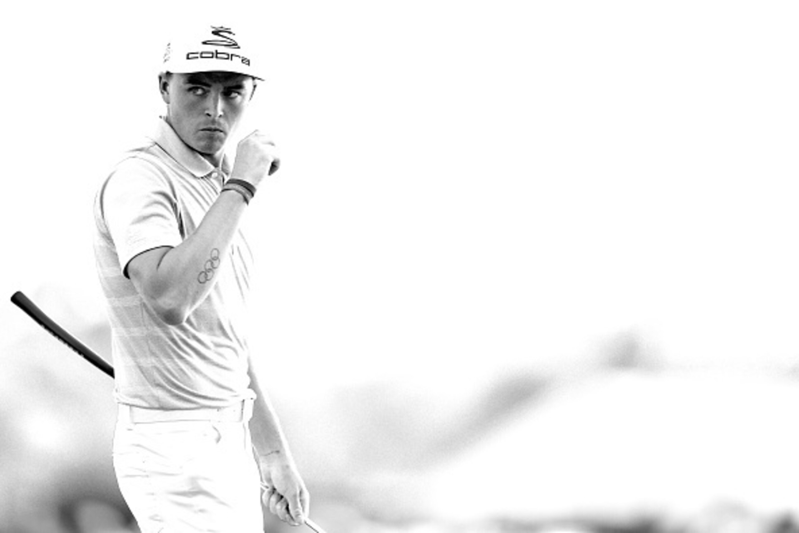 HUMBLE, TX - APRIL 02:  (EDITORS NOTE: Image has been digitally converted to black and white.)  Rickie Fowler reacts after putting on the 18th green during the final round of the Shell Houston Open at the Golf Club of Houston on April 2, 2017 in Humble, T