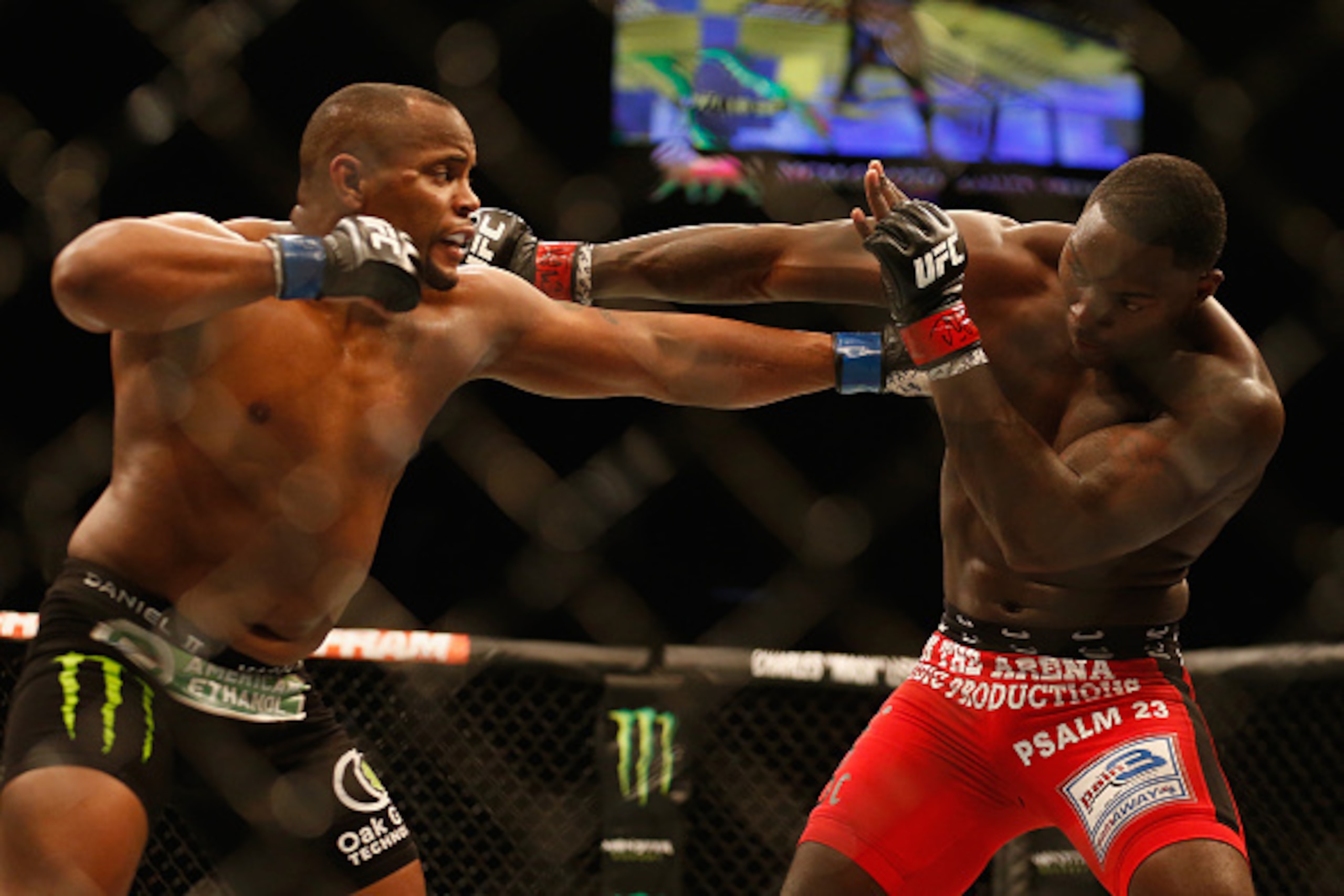 LAS VEGAS, NV - MAY 23:  (L-R) Daniel Cormier punches Anthony Johnson in their UFC light heavyweight championship bout during the UFC 187 event at the MGM Grand Garden Arena on May 23, 2015 in Las Vegas, Nevada.  (Photo by Christian Petersen/Zuffa LLC/Zuf