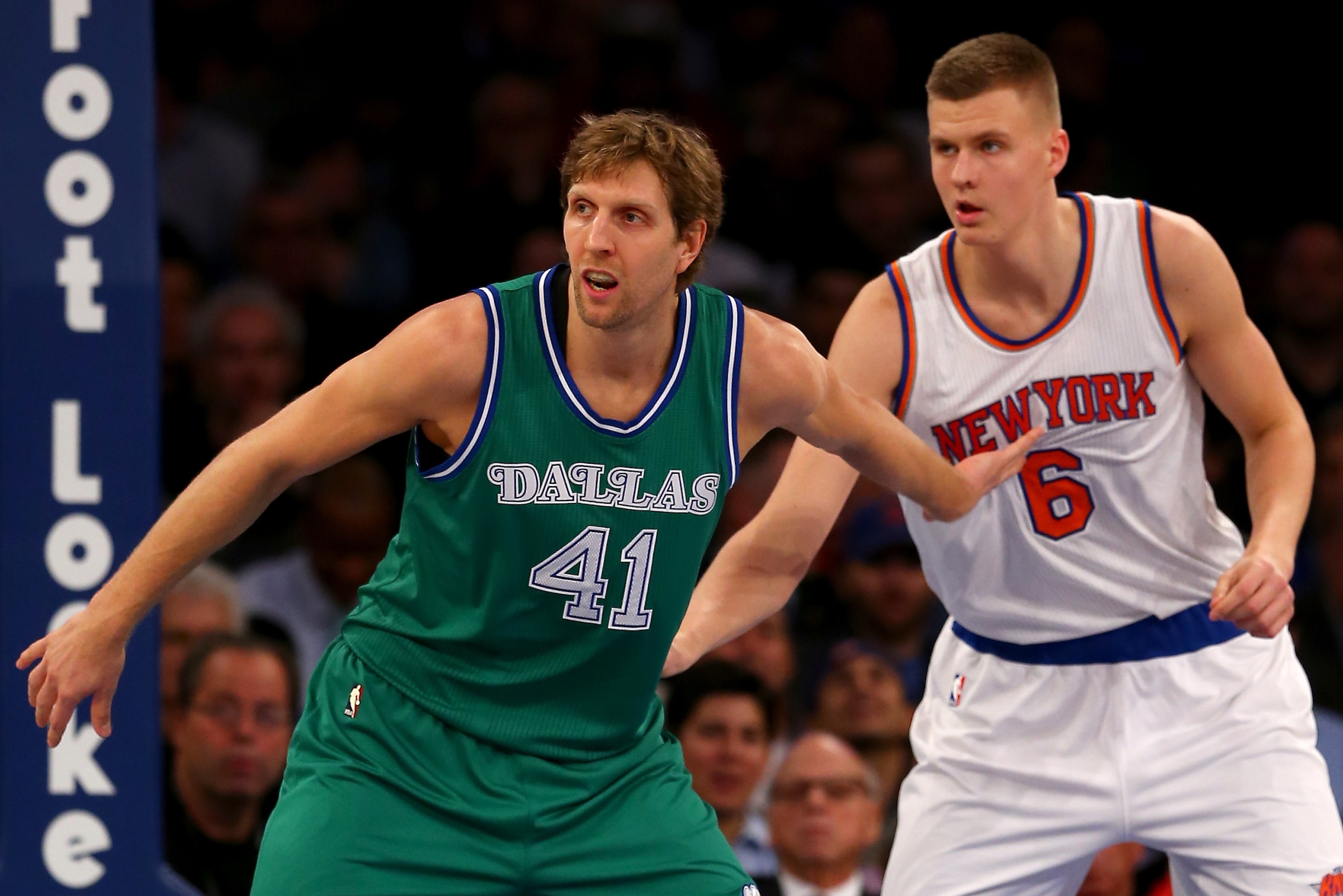 Nowitzki and New York's Kristaps Porzingis fight for position on December 7, 2015. Nowitzki and New York's Kristaps Porzingis fight for position on December 7, 2015.