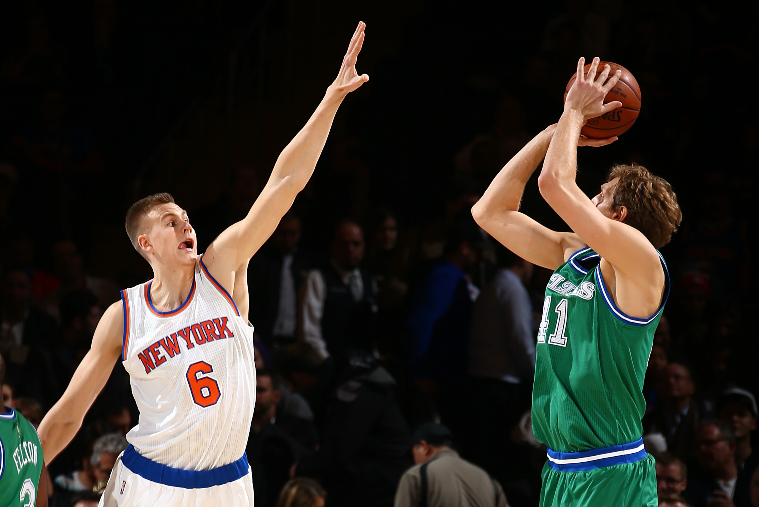 Porzingis defends against Nowitzki on December 7, 2015. Porzingis defends against Nowitzki on December 7, 2015.