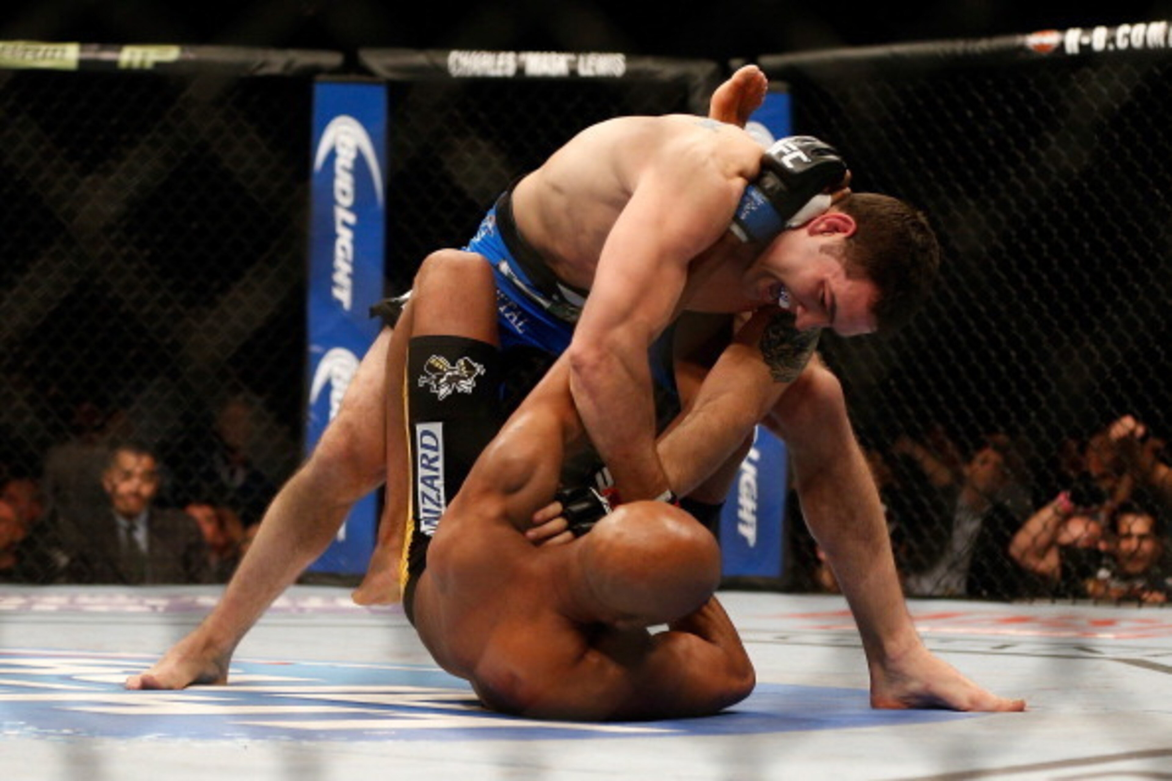 LAS VEGAS, NV - DECEMBER 28: Chris Weidman (top) punches Anderson Silva in their UFC middleweight championship bout during the UFC 168 event at the MGM Grand Garden Arena on December 28, 2013 in Las Vegas, Nevada. (Photo by Josh Hedges/Zuffa LLC/Zuffa LL LAS VEGAS, NV - DECEMBER 28: Chris Weidman (top) punches Anderson Silva in their UFC middleweight championship bout during the UFC 168 event at the MGM Grand Garden Arena on December 28, 2013 in Las Vegas, Nevada. (Photo by Josh Hedges/Zuffa LLC/Zuffa LL