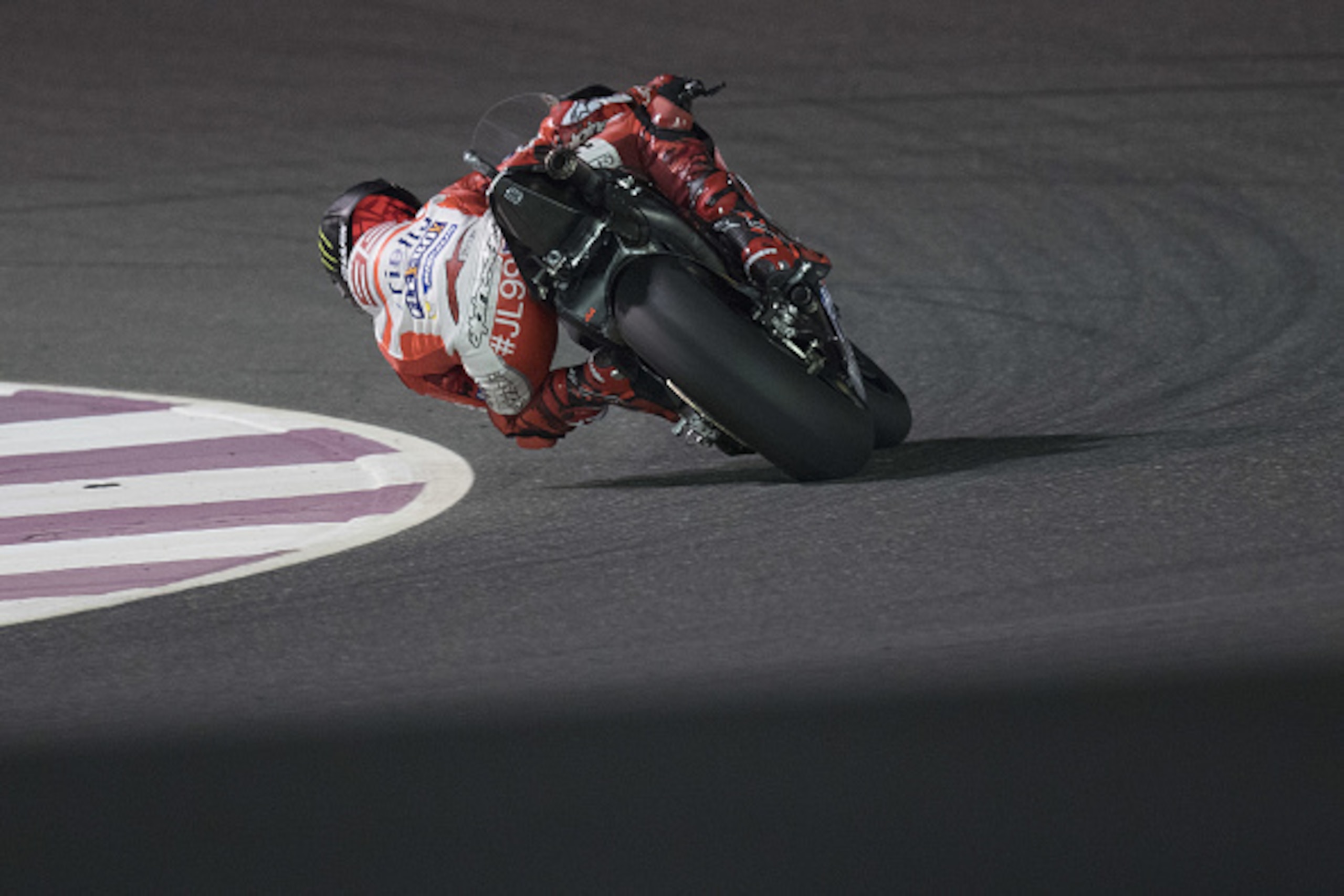 DOHA, QATAR - MARCH 24: Jorge Lorenzo of Spain and Ducati Team rounds the bend during the MotoGp of Qatar - Free Practice at Losail Circuit on March 24, 2017 in Doha, Qatar. (Photo by Mirco Lazzari gp/Getty Images) DOHA, QATAR - MARCH 24: Jorge Lorenzo of Spain and Ducati Team rounds the bend during the MotoGp of Qatar - Free Practice at Losail Circuit on March 24, 2017 in Doha, Qatar. (Photo by Mirco Lazzari gp/Getty Images)
