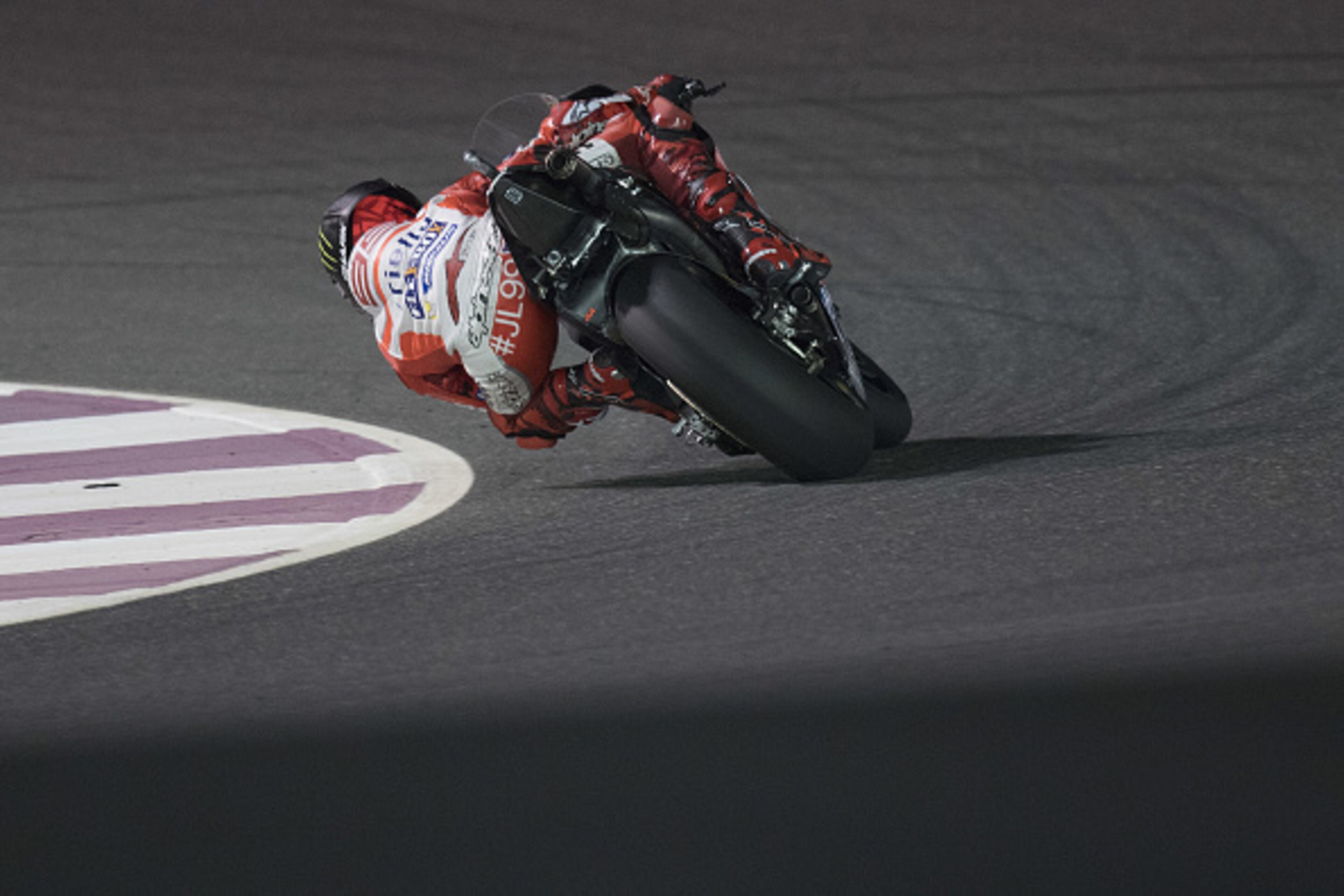DOHA, QATAR - MARCH 24: Jorge Lorenzo of Spain and Ducati Team  rounds the bend during the MotoGp of Qatar - Free Practice at Losail Circuit on March 24, 2017 in Doha, Qatar.  (Photo by Mirco Lazzari gp/Getty Images)
