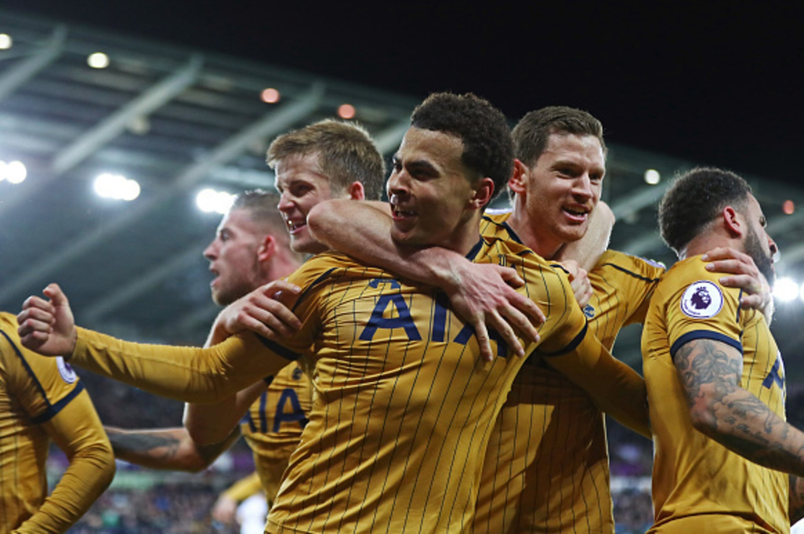 SWANSEA, WALES - APRIL 05: Dele Alli of Tottenham Hotspur celebrates scoring his sides first goal with his Tottenham Hotspur team mates during the Premier League match between Swansea City and Tottenham Hotspur at the Liberty Stadium on April 5, 2017 in S SWANSEA, WALES - APRIL 05: Dele Alli of Tottenham Hotspur celebrates scoring his sides first goal with his Tottenham Hotspur team mates during the Premier League match between Swansea City and Tottenham Hotspur at the Liberty Stadium on April 5, 2017 in S