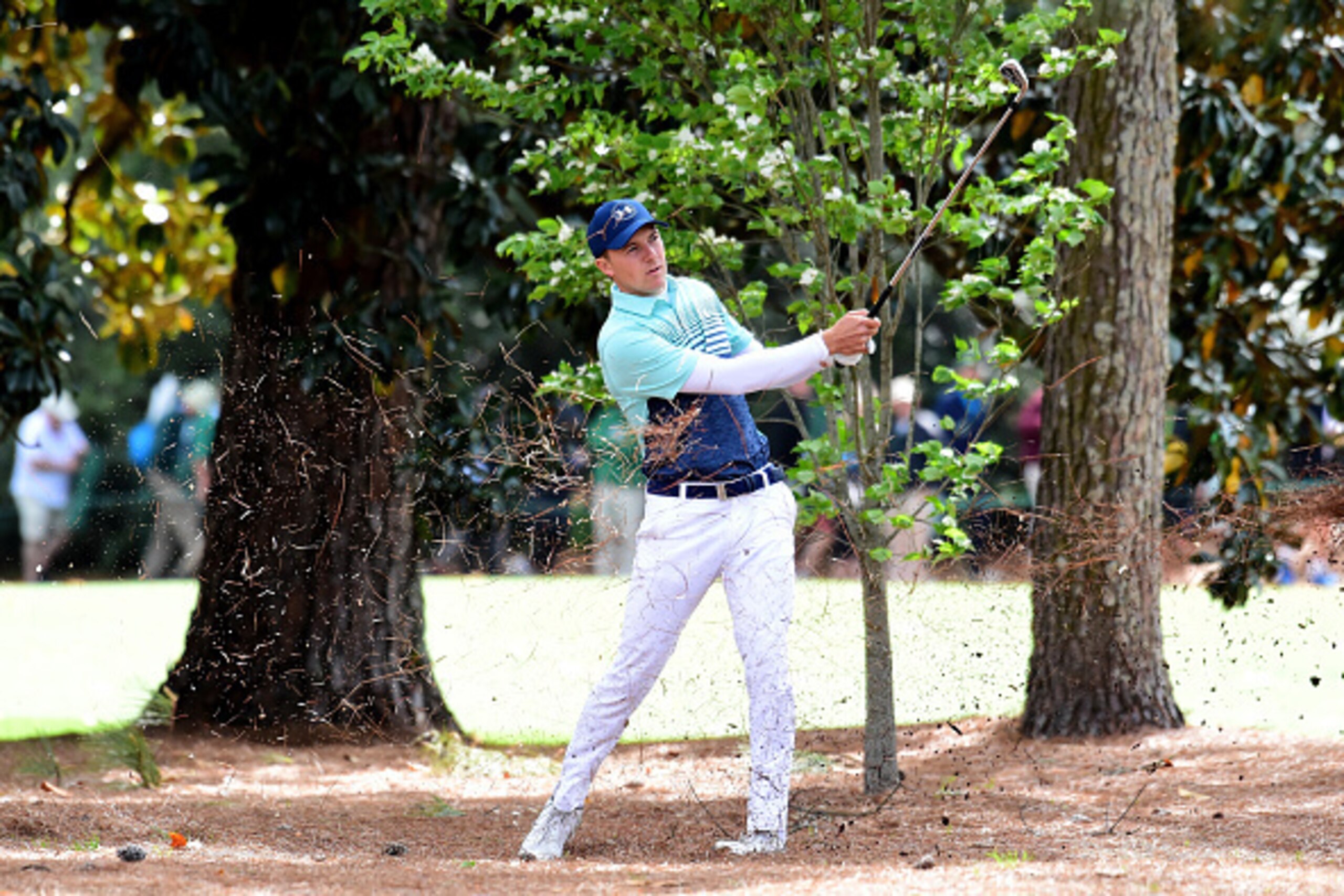 AUGUSTA, GA - APRIL 06:  Jordan Spieth of the United States plays his second shot on the 18th hole during the first round of the 2017 Masters Tournament at Augusta National Golf Club on April 6, 2017 in Augusta, Georgia.  (Photo by Harry How/Getty Images)