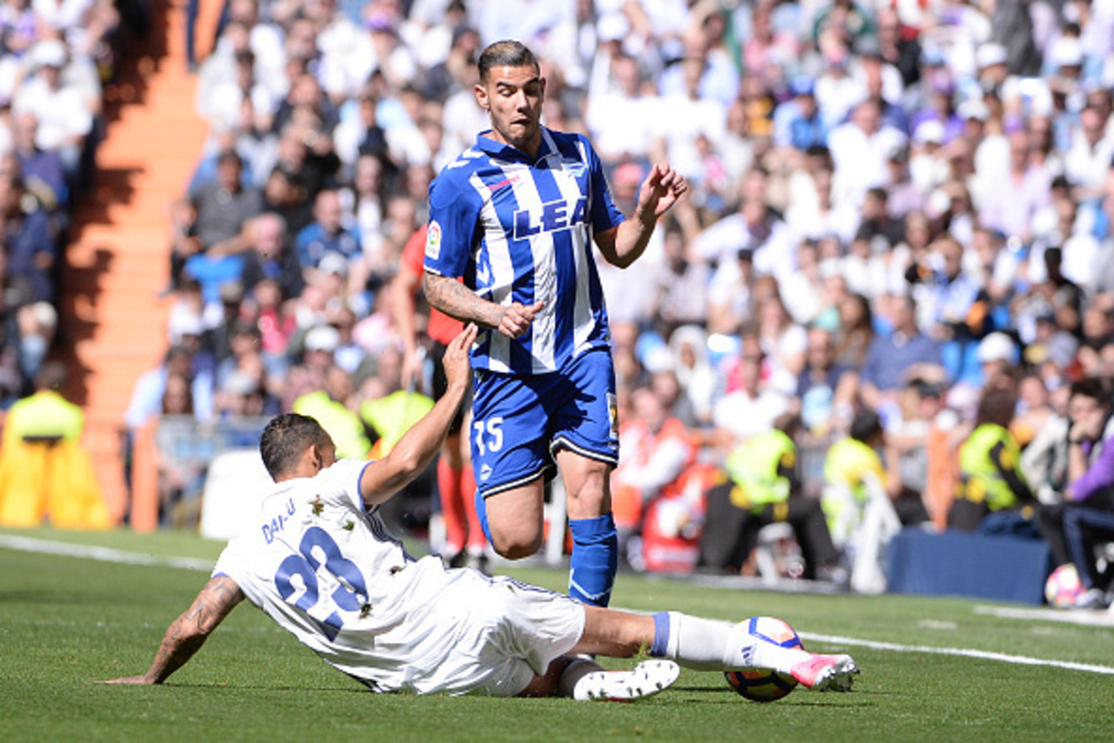 MADRID, SPAIN - APRIL 2: Theo Hernandez, #15 of Deportivo Alaves and Danilo, #23 of Real Madrid during the La Liga match between Real Madrid CF v Deportivo Alaves at Santiago Bernabeu on April 2, 2017 in Madrid, Spain. (Photo by Sonia Canada/Getty Imag MADRID, SPAIN - APRIL 2: Theo Hernandez, #15 of Deportivo Alaves and Danilo, #23 of Real Madrid during the La Liga match between Real Madrid CF v Deportivo Alaves at Santiago Bernabeu on April 2, 2017 in Madrid, Spain. (Photo by Sonia Canada/Getty Imag