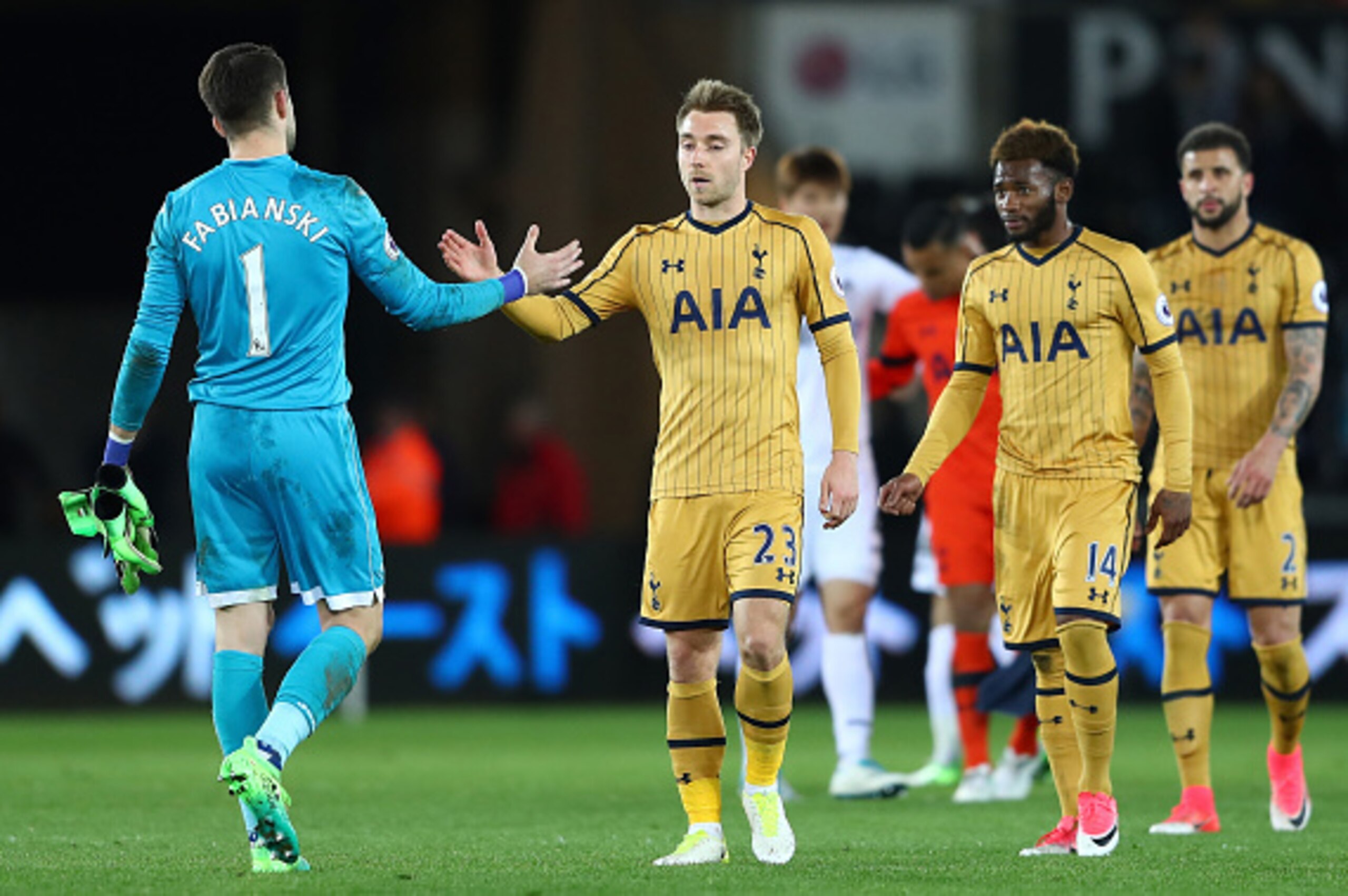 SWANSEA, WALES - APRIL 05: Lukasz Fabianski of Swansea City (L) and Christian Eriksen of Tottenham Hotspur (R) shake hands after the Premier League match between Swansea City and Tottenham Hotspur at the Liberty Stadium on April 5, 2017 in Swansea, Wales.