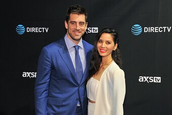 SAN FRANCISCO, CA - FEBRUARY 06:  NFL player Aaron Rodgers (L) and actress Olivia Munn attend the DirecTV and Pepsi Super Saturday Night featuring Red Hot Chili Peppers at Pier 70 on February 6, 2016 in San Francisco, California.  (Photo by Steve Jennings