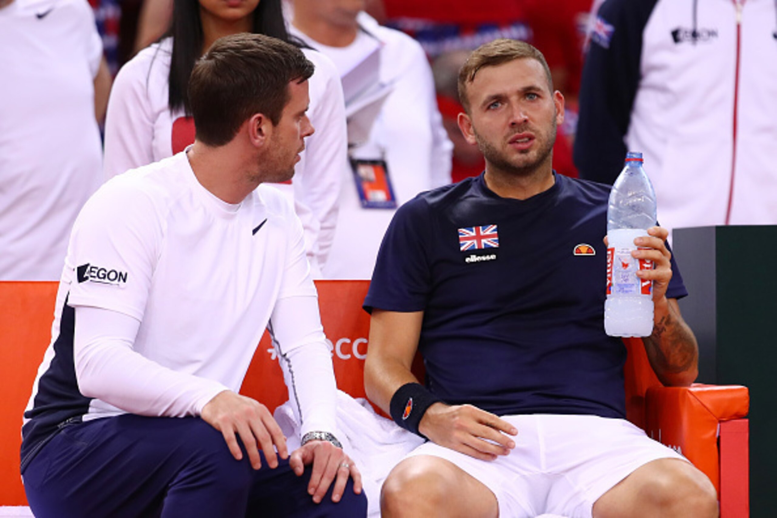ROUEN, FRANCE - APRIL 07:  (L-R) Leon Smith the Great Britain captain speaks with Daniel Evans of Great Britain during the singles match against Jeremy Chardy of France on day one of the Davis Cup World Group Quarter-Final between France and Great Britain