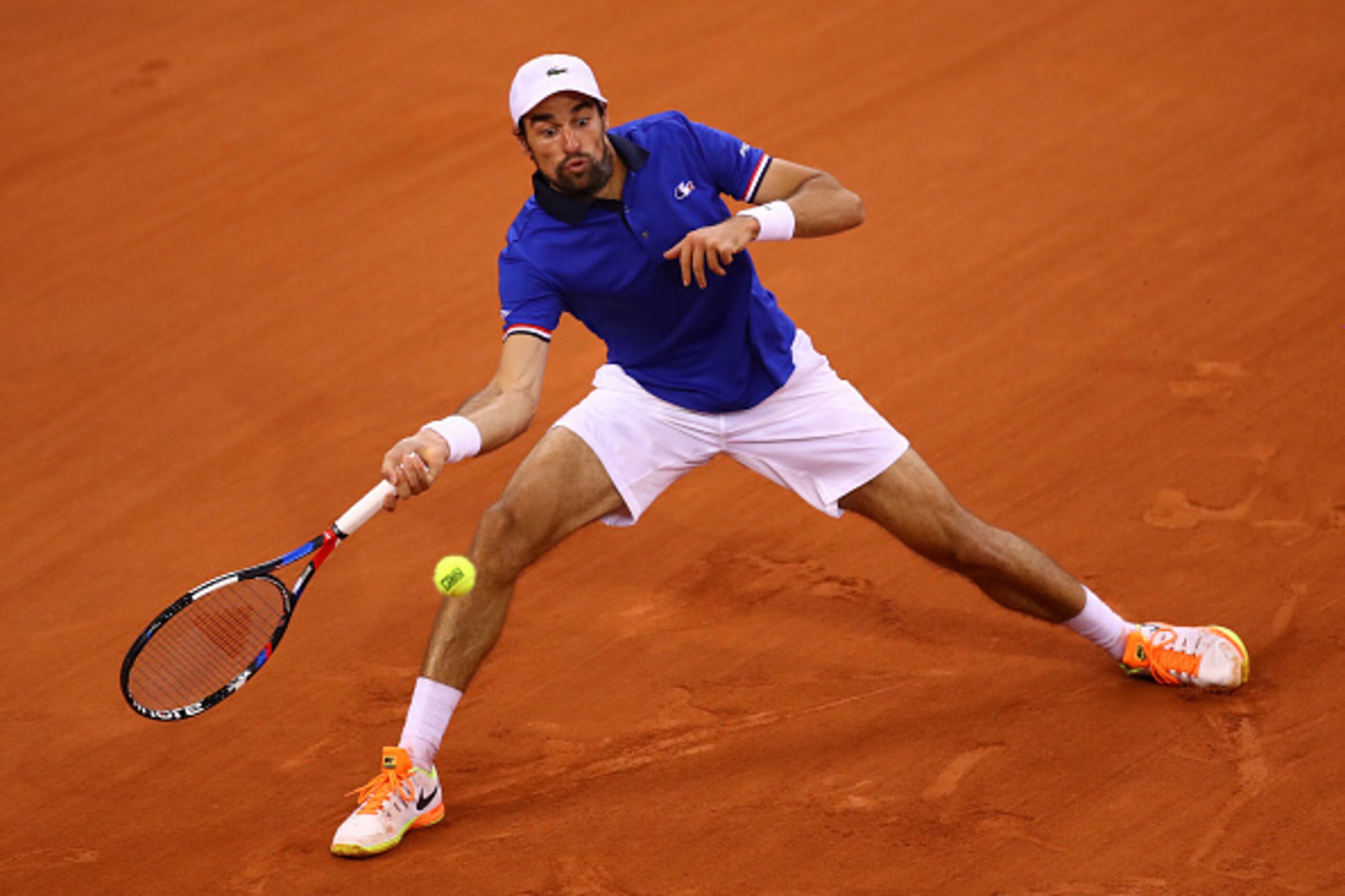 ROUEN, FRANCE - APRIL 07:  Jeremy Chardy of France plays a forehand during the singles match against Daniel Evans of Great Britain on day one of the Davis Cup World Group Quarter-Final between France and Great Britain at Kindarena on April 7, 2017 in Roue