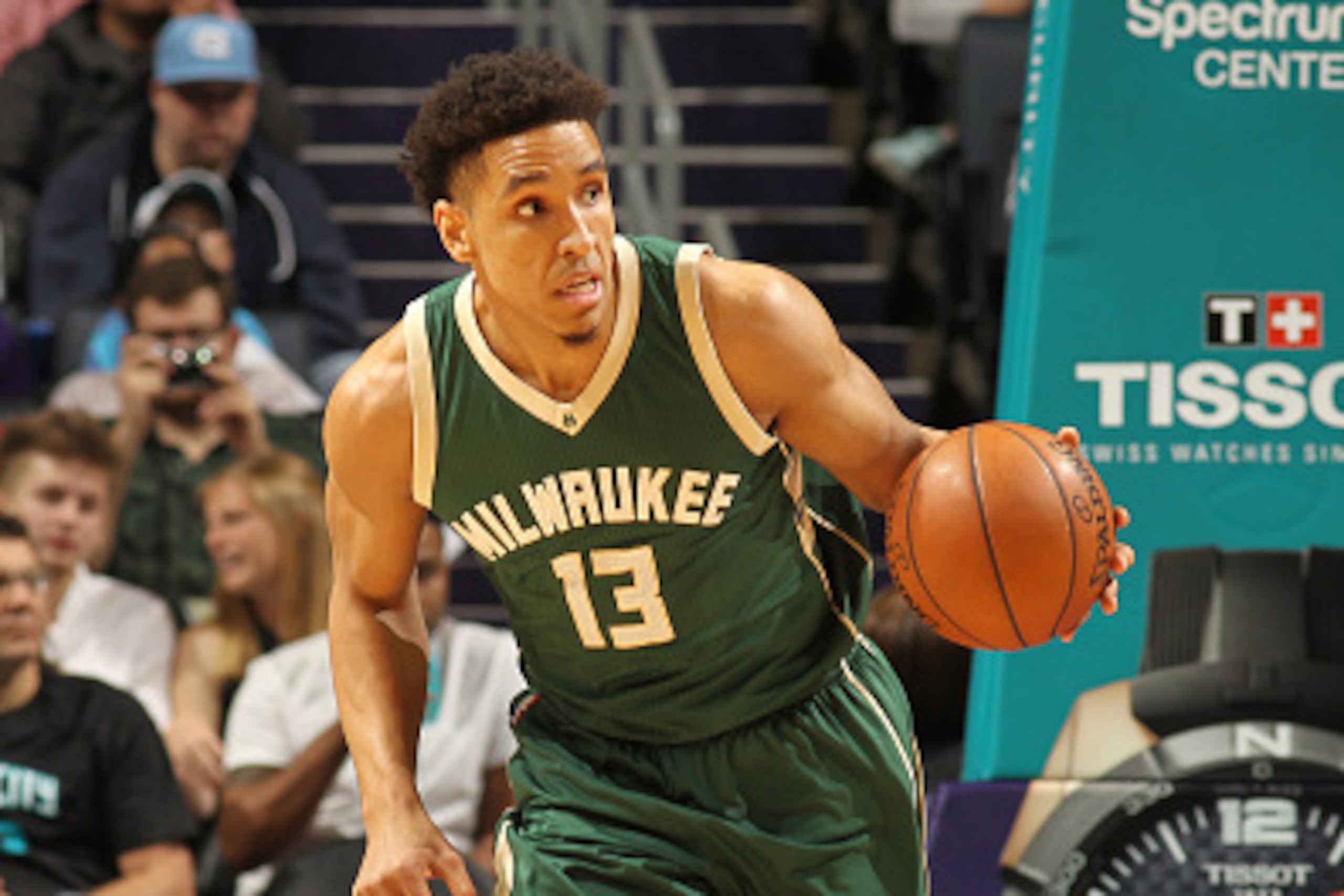CHARLOTTE, NC - MARCH 28: Malcolm Brogdon #13 of the Milwaukee Bucks handles the ball during a game against the Charlotte Hornets on March 28, 2017 at the Spectrum Center in Charlotte, North Carolina. NOTE TO USER: User expressly acknowledges and agrees CHARLOTTE, NC - MARCH 28: Malcolm Brogdon #13 of the Milwaukee Bucks handles the ball during a game against the Charlotte Hornets on March 28, 2017 at the Spectrum Center in Charlotte, North Carolina. NOTE TO USER: User expressly acknowledges and agrees