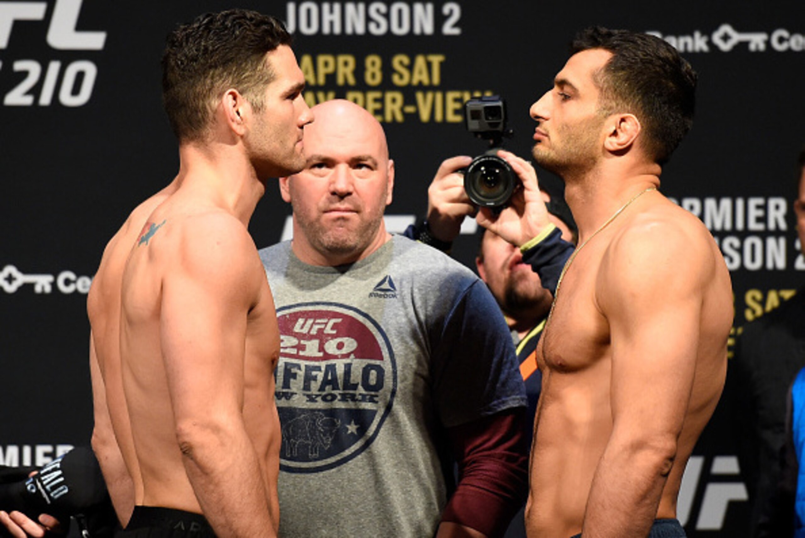 BUFFALO, NY - APRIL 07: (L-R) Chris Weidman and Gegard Mousasi of the Netherlands face off during the UFC 210 weigh-in at the KeyBank Center on April 7, 2017 in Buffalo, New York. (Photo by Josh Hedges/Zuffa LLC/Zuffa LLC via Getty Images) BUFFALO, NY - APRIL 07: (L-R) Chris Weidman and Gegard Mousasi of the Netherlands face off during the UFC 210 weigh-in at the KeyBank Center on April 7, 2017 in Buffalo, New York. (Photo by Josh Hedges/Zuffa LLC/Zuffa LLC via Getty Images)