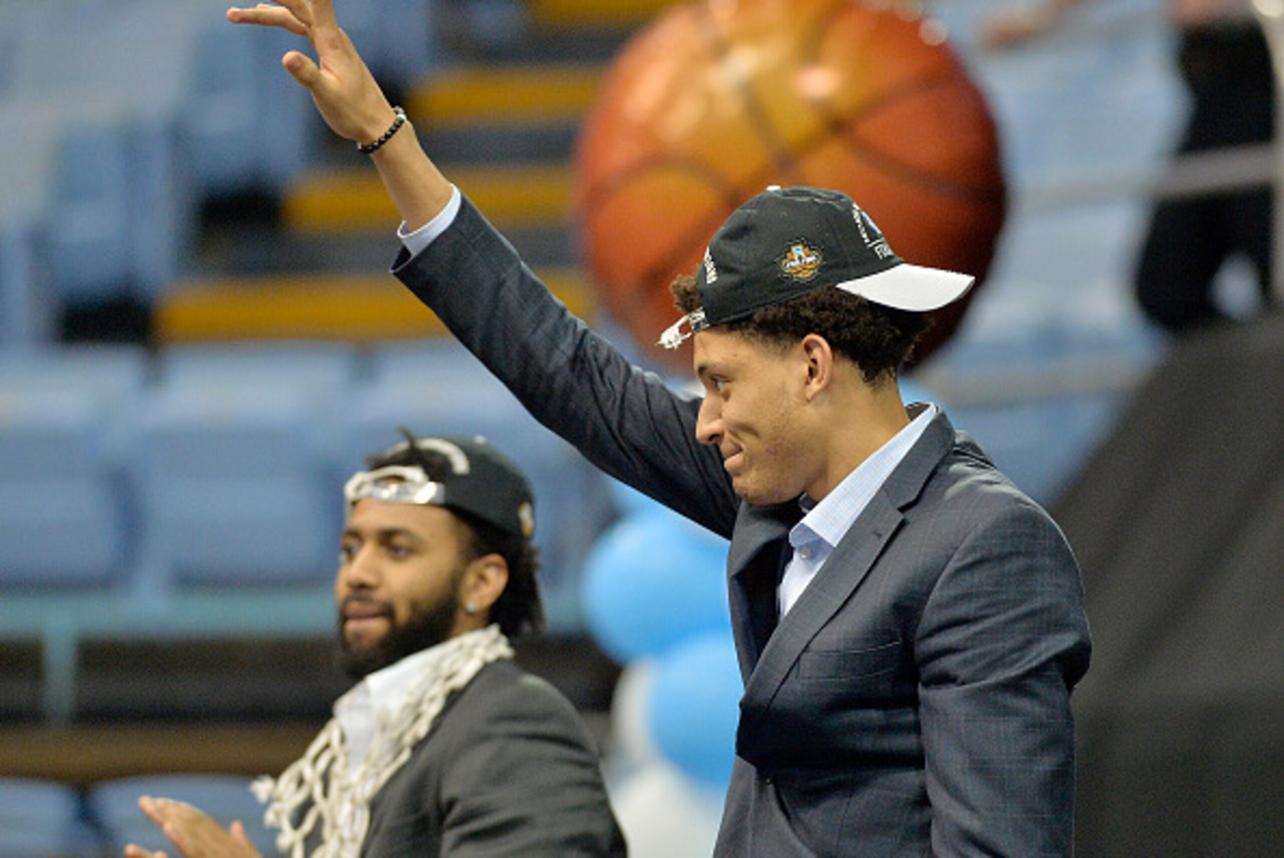 CHAPEL HILL, NC- APRIL 4:  Joel Berry II (R) and Justin Jackson of the North Carolina Tar Heels are recognized by having their jerseys retired during their welcome-home reception for the NCAA men's basketball team on April 4, 2017 in Chapel Hill, North Ca
