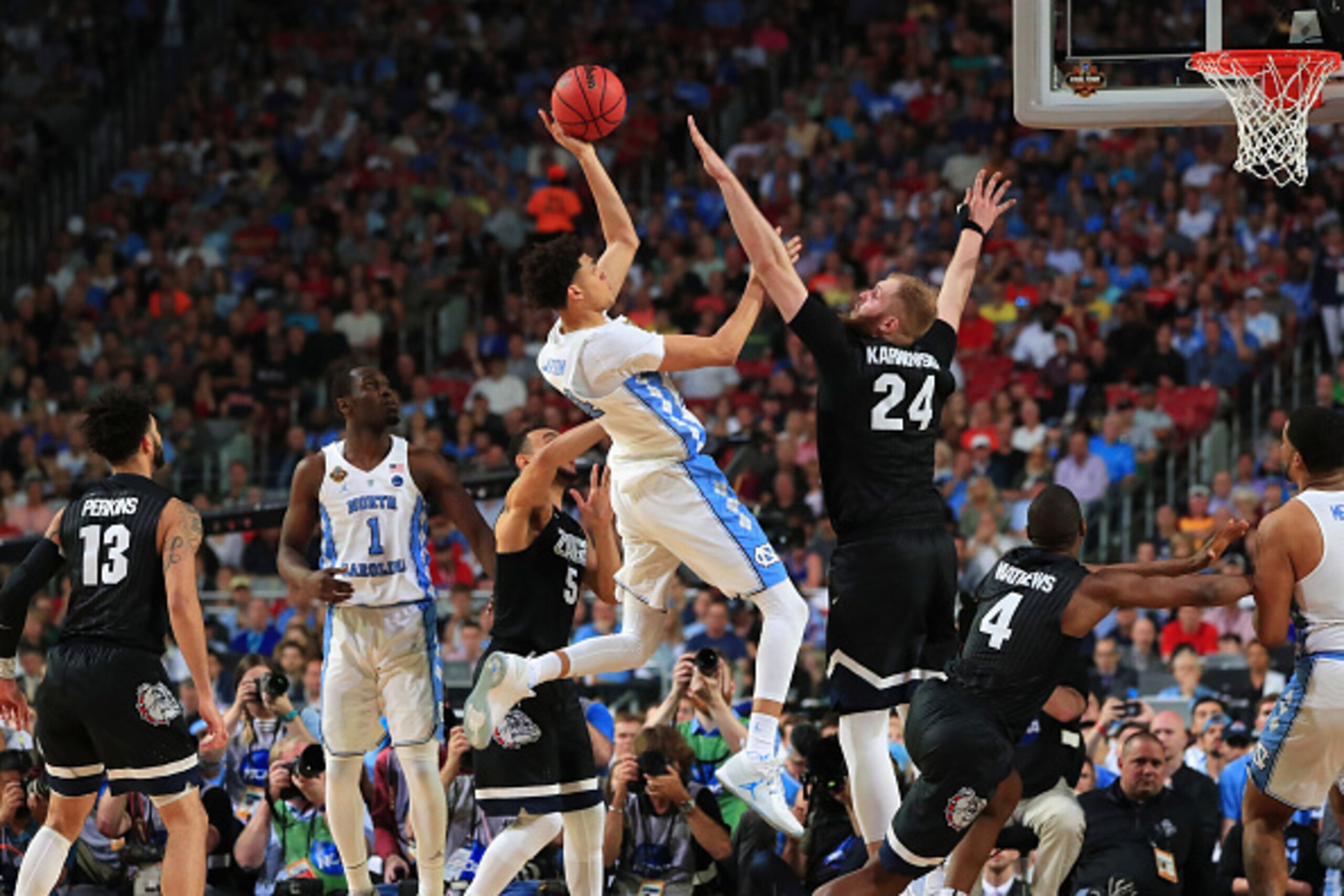 GLENDALE, AZ - APRIL 03: Justin Jackson #44 of the North Carolina Tar Heels shoots against Przemek Karnowski #24 of the Gonzaga Bulldogs in the second half during the 2017 NCAA Men's Final Four National Championship game at University of Phoenix Stadium o