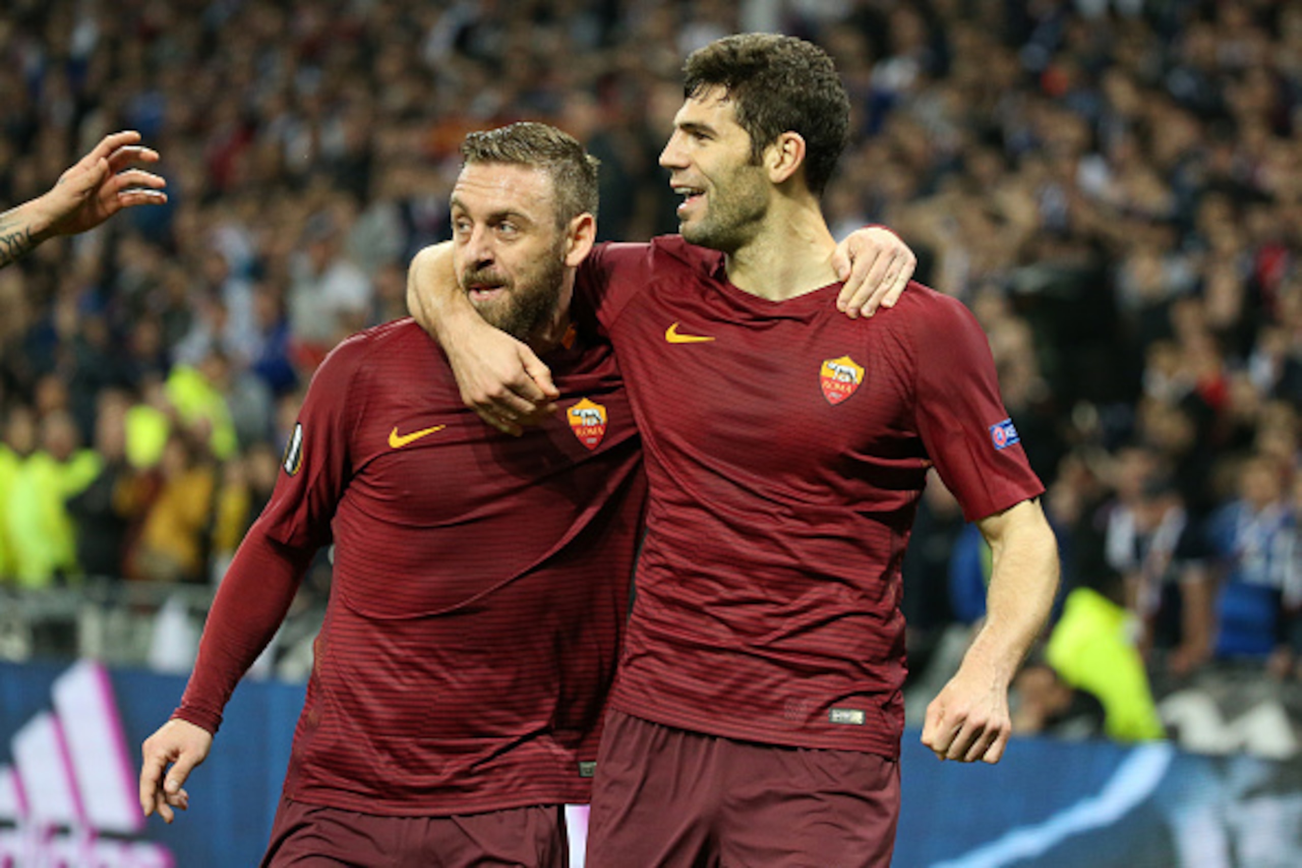 LYON, FRANCE - MARCH 9: Federico Fazio of AS Roma (right) celebrates his goal with Daniele de Rossi of AS Roma during the UEFA Europa  League Round of 16 first leg match between Olympique Lyonnais (OL) and AS Roma at Parc OL on March 9, 2017 in Lyon, Fran