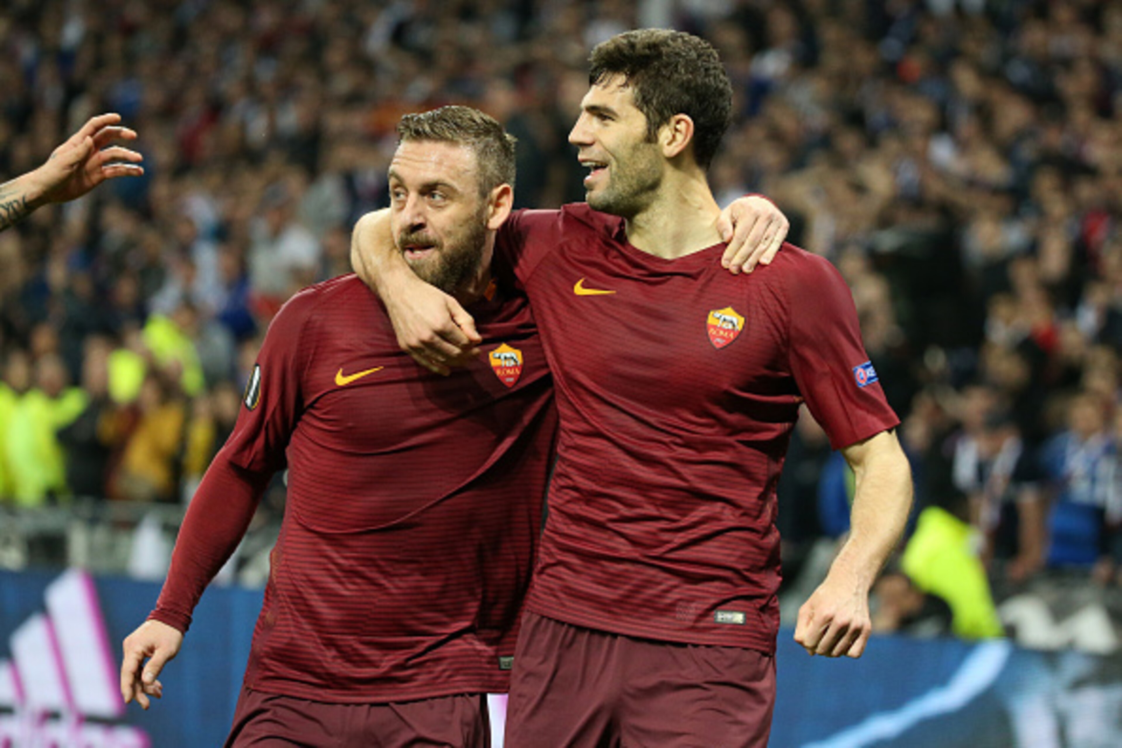 LYON, FRANCE - MARCH 9: Federico Fazio of AS Roma (right) celebrates his goal with Daniele de Rossi of AS Roma during the UEFA Europa  League Round of 16 first leg match between Olympique Lyonnais (OL) and AS Roma at Parc OL on March 9, 2017 in Lyon, Fran