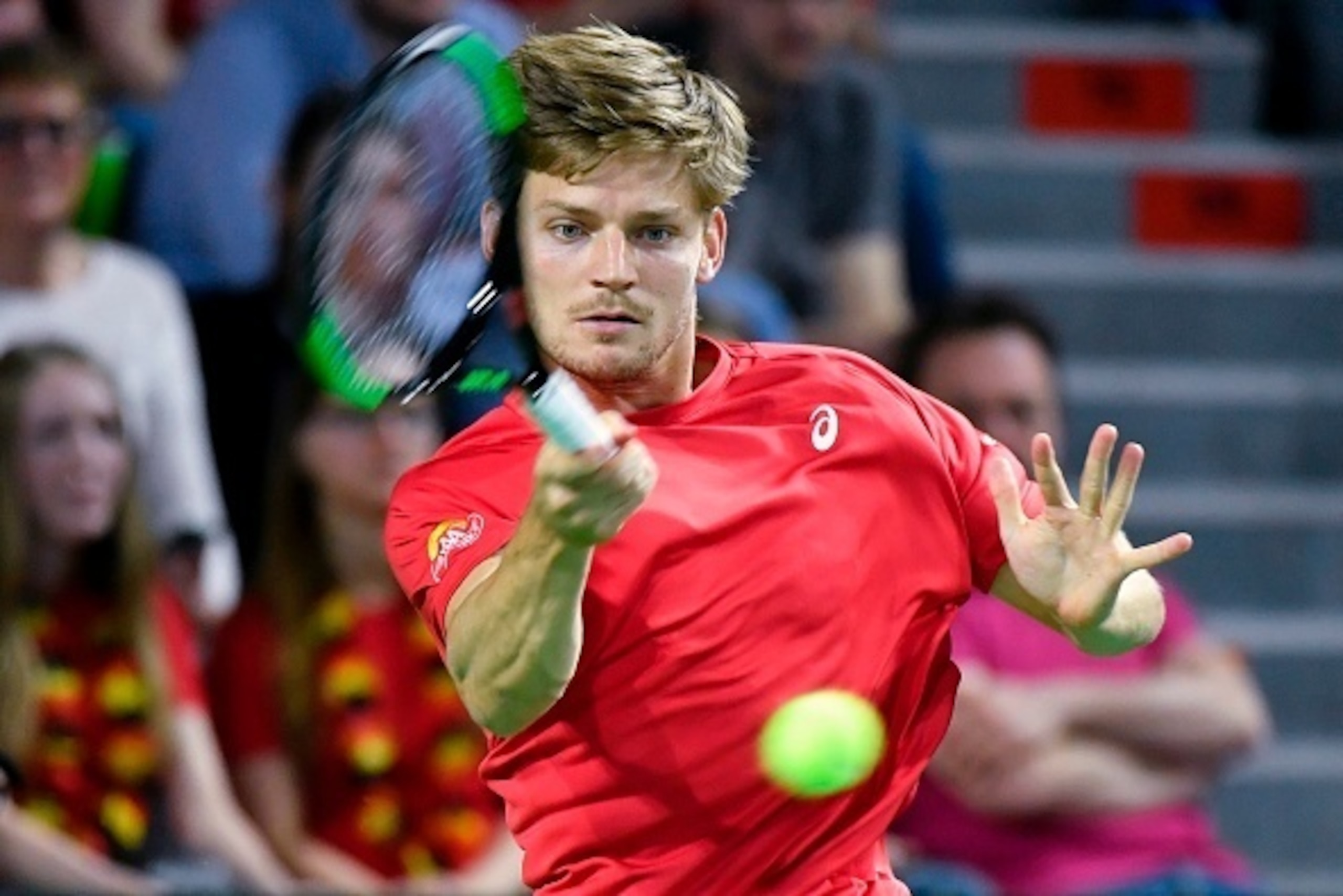 Belgium's David Goffin returns a ball to Italy's Paolo Lorenzi during the Davis Cup World Group quarter-final tennis match between Belgium and Italy, on April 9, 2017, in Charleroi.  / AFP PHOTO / BELGA / BENOIT DOPPAGNE / Belgium OUT        (Photo credit