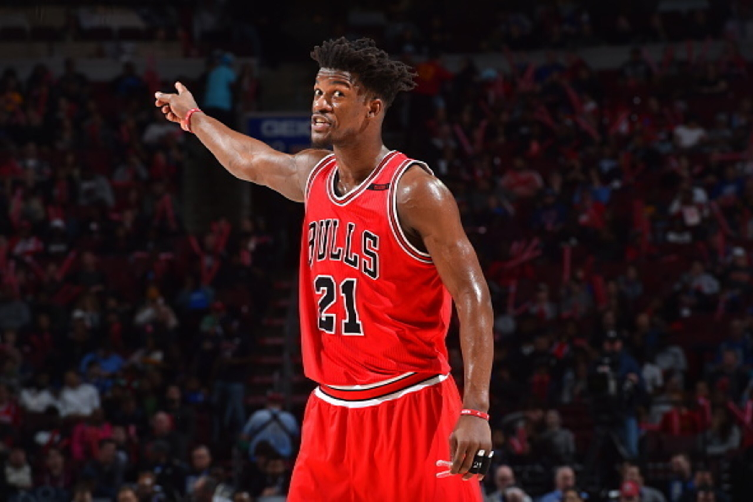 PHILADELPHIA,PA -  APRIL 6 :  Jimmy Butler #21 of the Chicago Bulls points downcourt against the Philadelphia 76ers at Wells Fargo Center on April 6, 2017 in Philadelphia, Pennsylvania NOTE TO USER: User expressly acknowledges and agrees that, by download