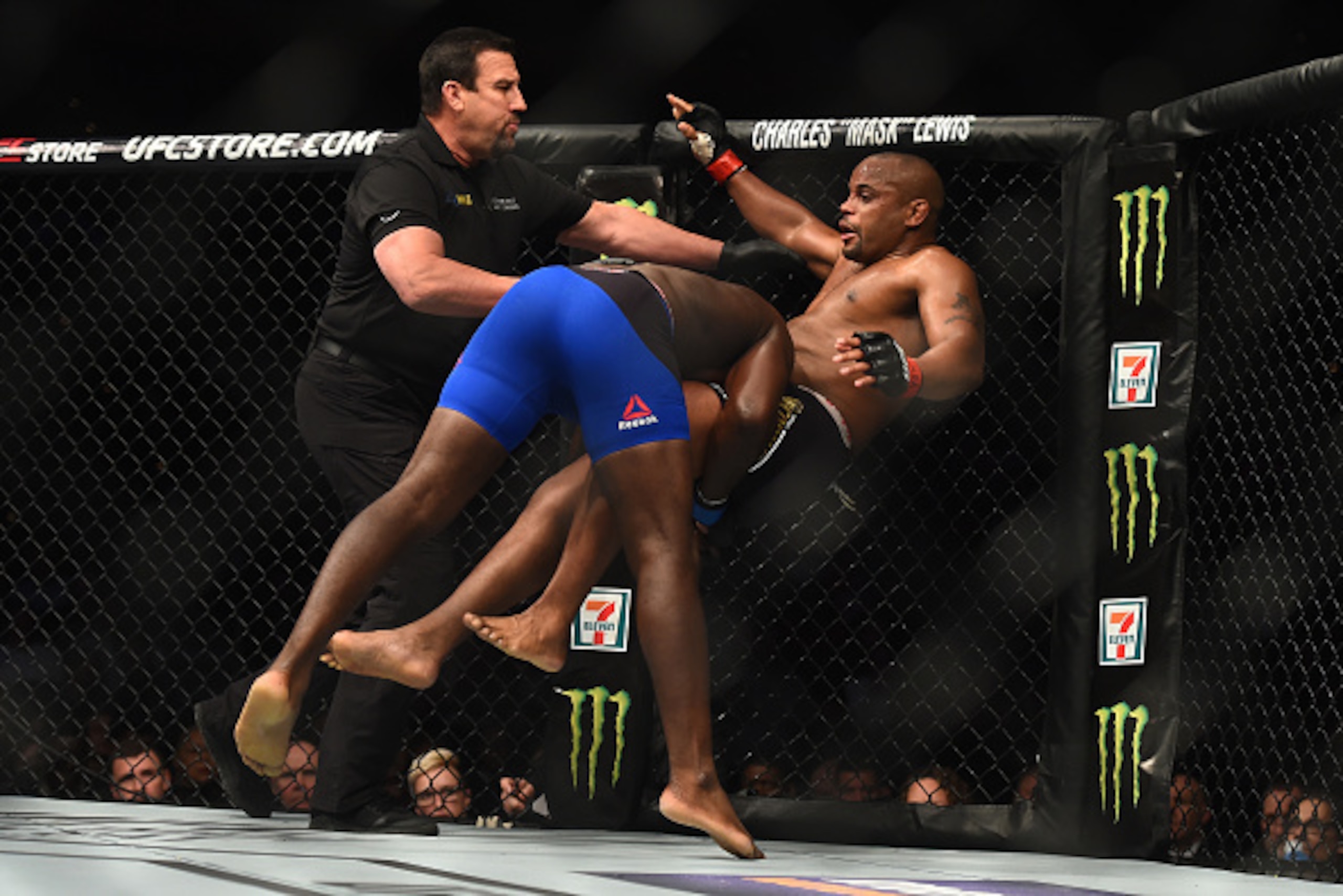 BUFFALO, NY - APRIL 08:  (L-R) Anthony Johnson takes down Daniel Cormier in their UFC light heavyweight championship bout during the UFC 210 event at the KeyBank Center on April 8, 2017 in Buffalo, New York. (Photo by Jeff Bottari/Zuffa LLC/Zuffa LLC via 