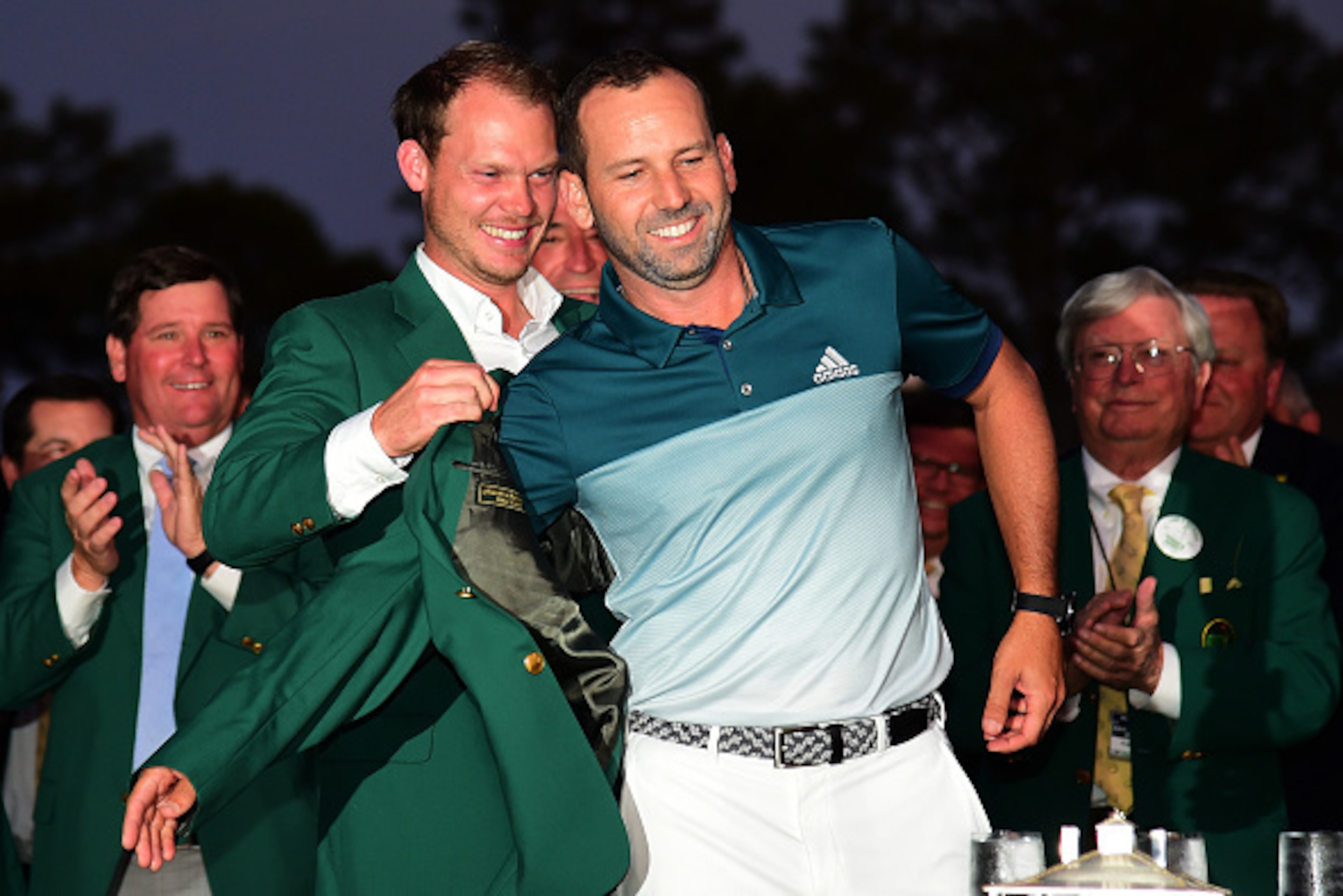 AUGUSTA, GA - APRIL 09: Danny Willett of England presents Sergio Garcia of Spain with the Green Jacket after Garcia won in a playoff during the final round of the 2017 Masters Tournament at Augusta National Golf Club on April 9, 2017 in Augusta, Georgia. AUGUSTA, GA - APRIL 09: Danny Willett of England presents Sergio Garcia of Spain with the Green Jacket after Garcia won in a playoff during the final round of the 2017 Masters Tournament at Augusta National Golf Club on April 9, 2017 in Augusta, Georgia.