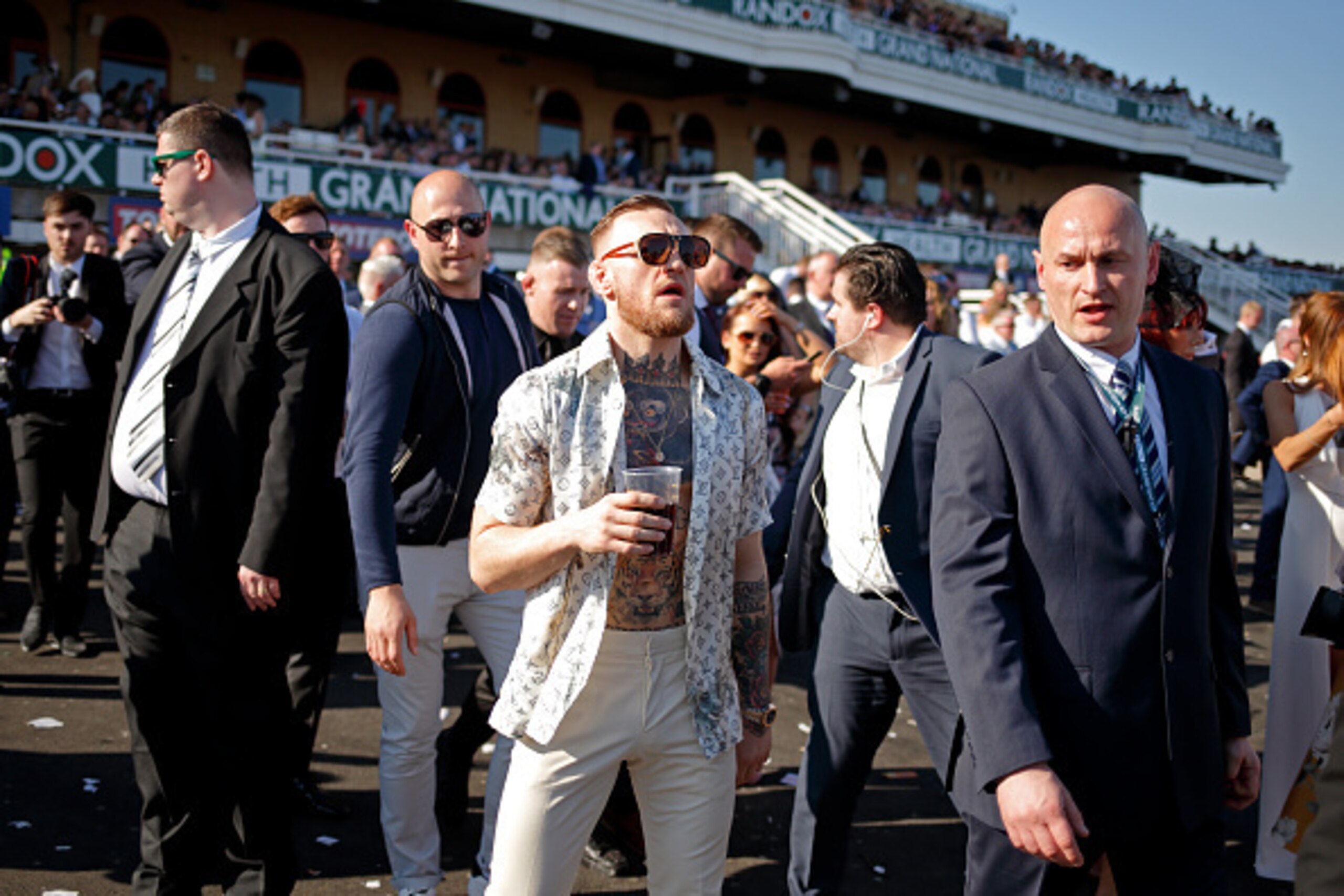 LIVERPOOL, UNITED KINGDOM - APRIL 08: (EMBARGOED FOR PUBLICATION IN UK NEWSPAPERS UNTIL 48 HOURS AFTER CREATE DATE AND TIME) Conor McGregor (c), current UFC Lightweight Champion, attends day 3 'Grand National Day' of the Randox Health Grand National Festi