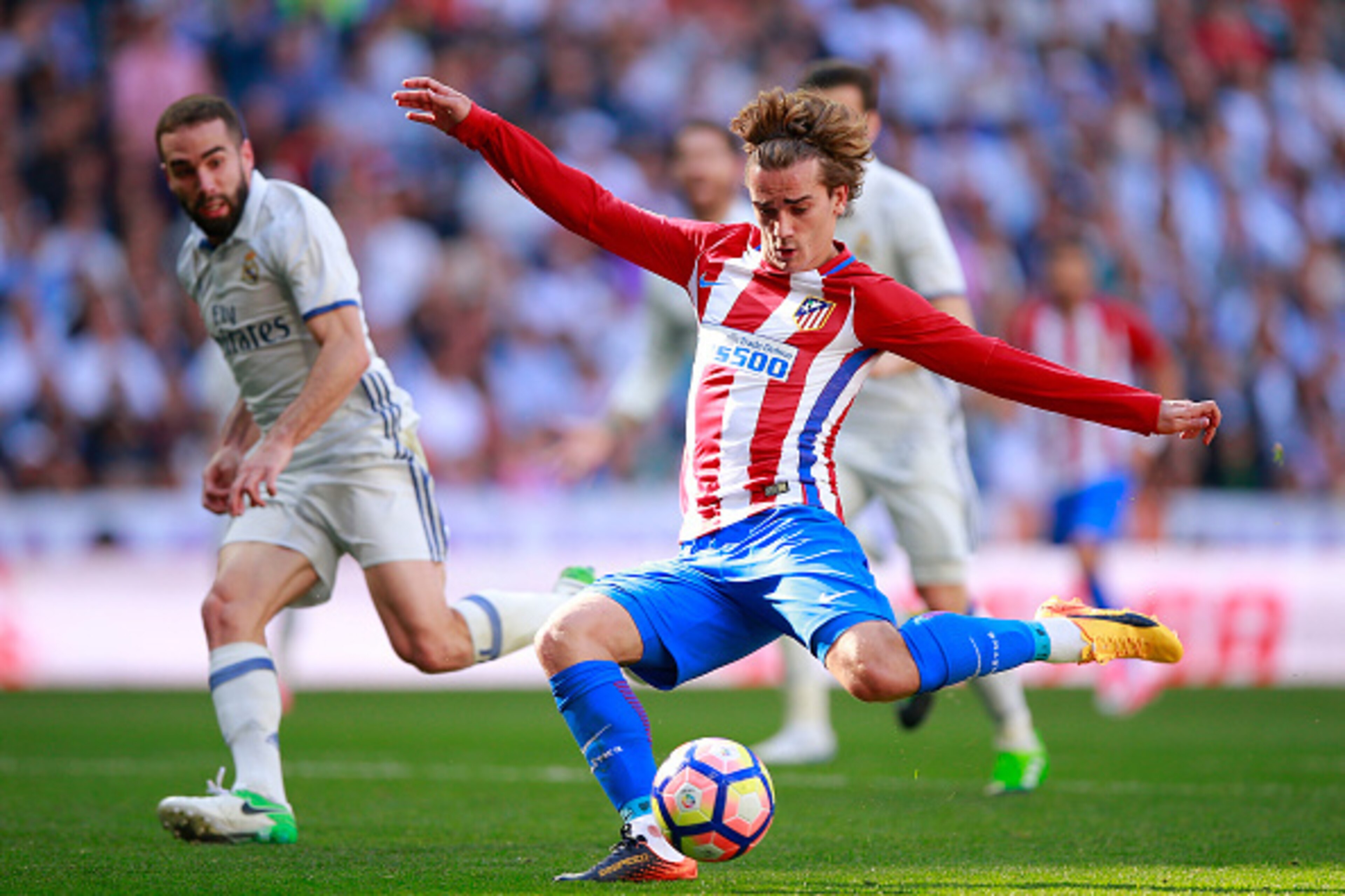 MADRID, SPAIN - APRIL 08: Antoine Griezmann of Atletico de Madrid scores their opening goal during the La Liga match between Real Madrid CF and Club Atletico de Madrid at Estadio Santiago Bernabeu on April 8, 2017 in Madrid, Spain. (Photo by Gonzalo Arro MADRID, SPAIN - APRIL 08: Antoine Griezmann of Atletico de Madrid scores their opening goal during the La Liga match between Real Madrid CF and Club Atletico de Madrid at Estadio Santiago Bernabeu on April 8, 2017 in Madrid, Spain. (Photo by Gonzalo Arro