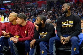 LOS ANGELES, CA - MARCH 18:  (left to right) Kyle Korver #26, Kyrie Irving #2 and Lebron James #23 of the Cleveland Cavaliers sitting out the game against the Los Angeles Clippers on March 18, 2017 at STAPLES Center in Los Angeles, California. NOTE TO USE