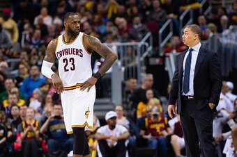 CLEVELAND, OH - FEBRUARY 11: LeBron James #23 talks with head coach Tyronn Lue of the Cleveland Cavaliers during the second half against the Denver Nuggets at Quicken Loans Arena on February 11, 2017 in Cleveland, Ohio. The Cavaliers defeated the Nuggets 